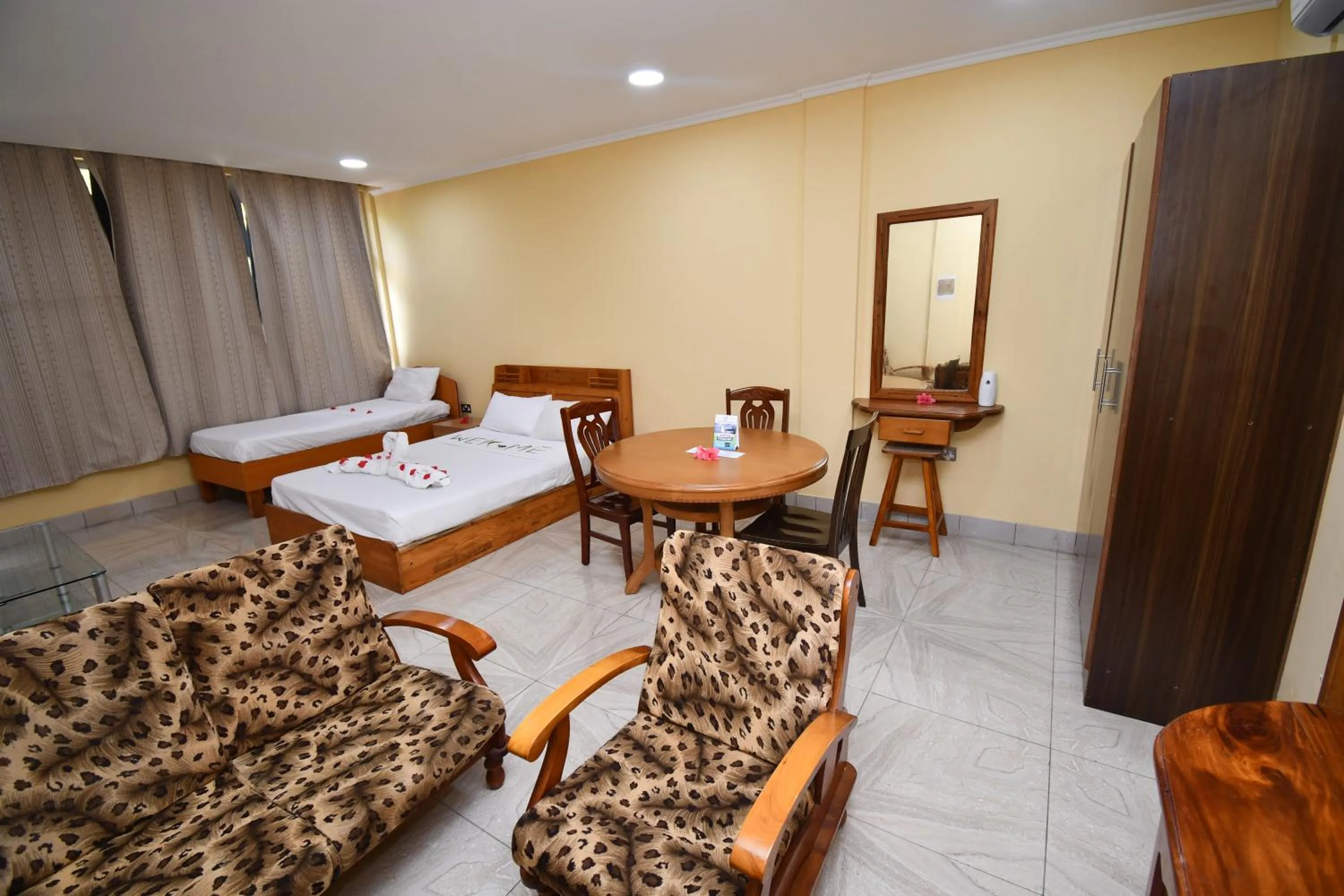 Bed in Reef Holiday Apartments