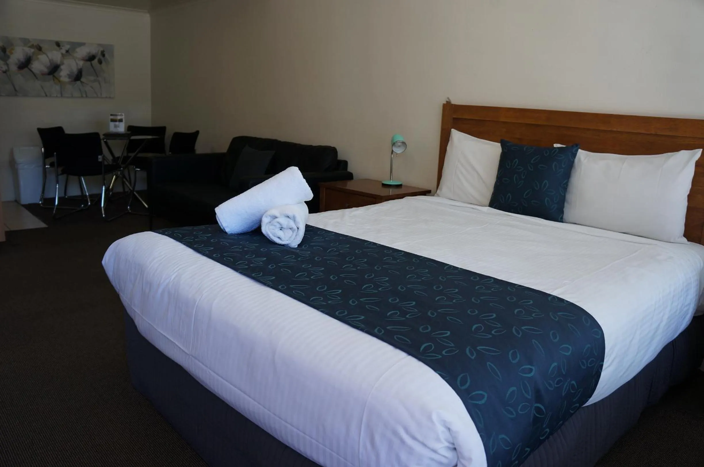 Bed in Waves Motel and Apartments