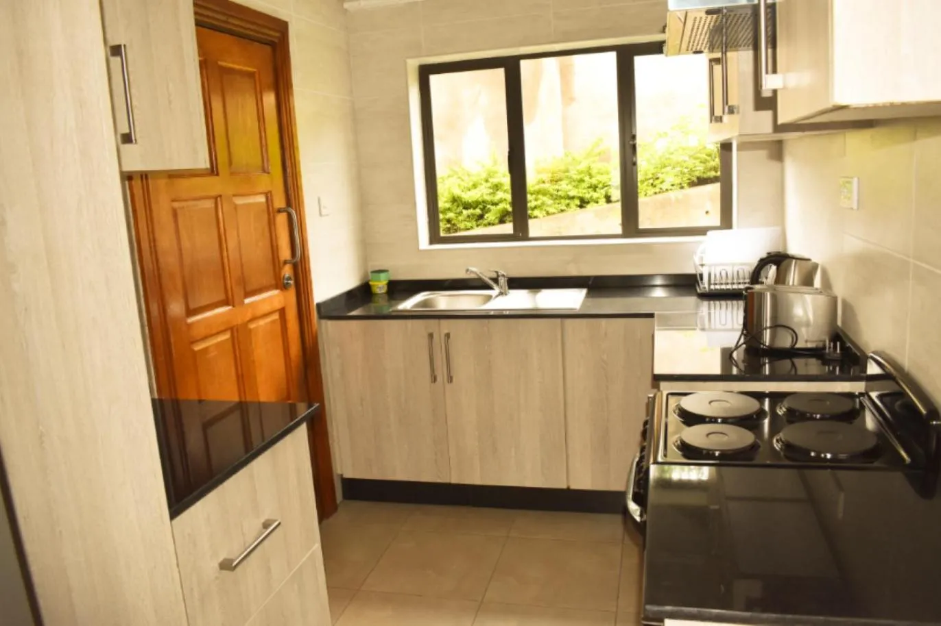 Kitchen or kitchenette in Wadonda Suites