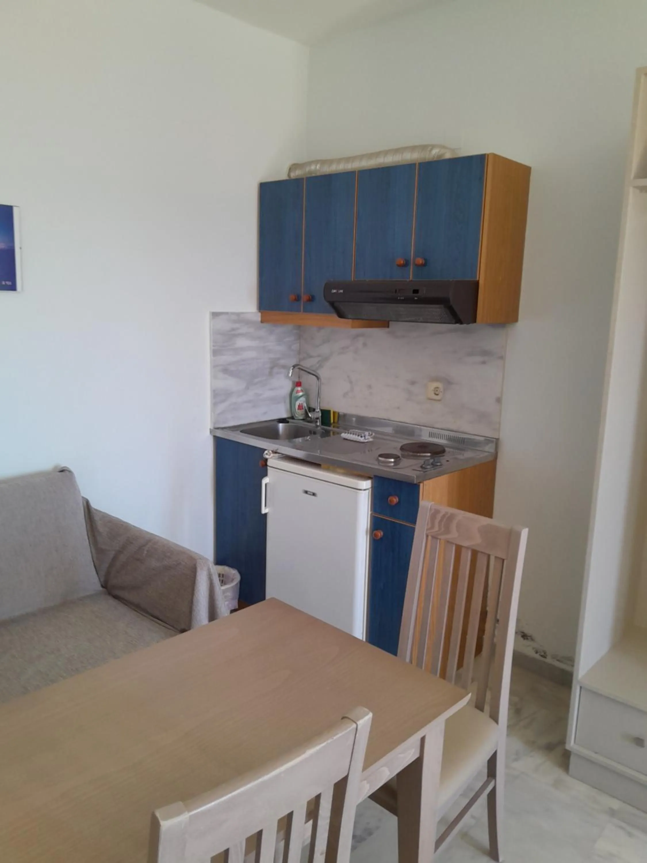 Kitchen or kitchenette in Kavos Melissa Studios