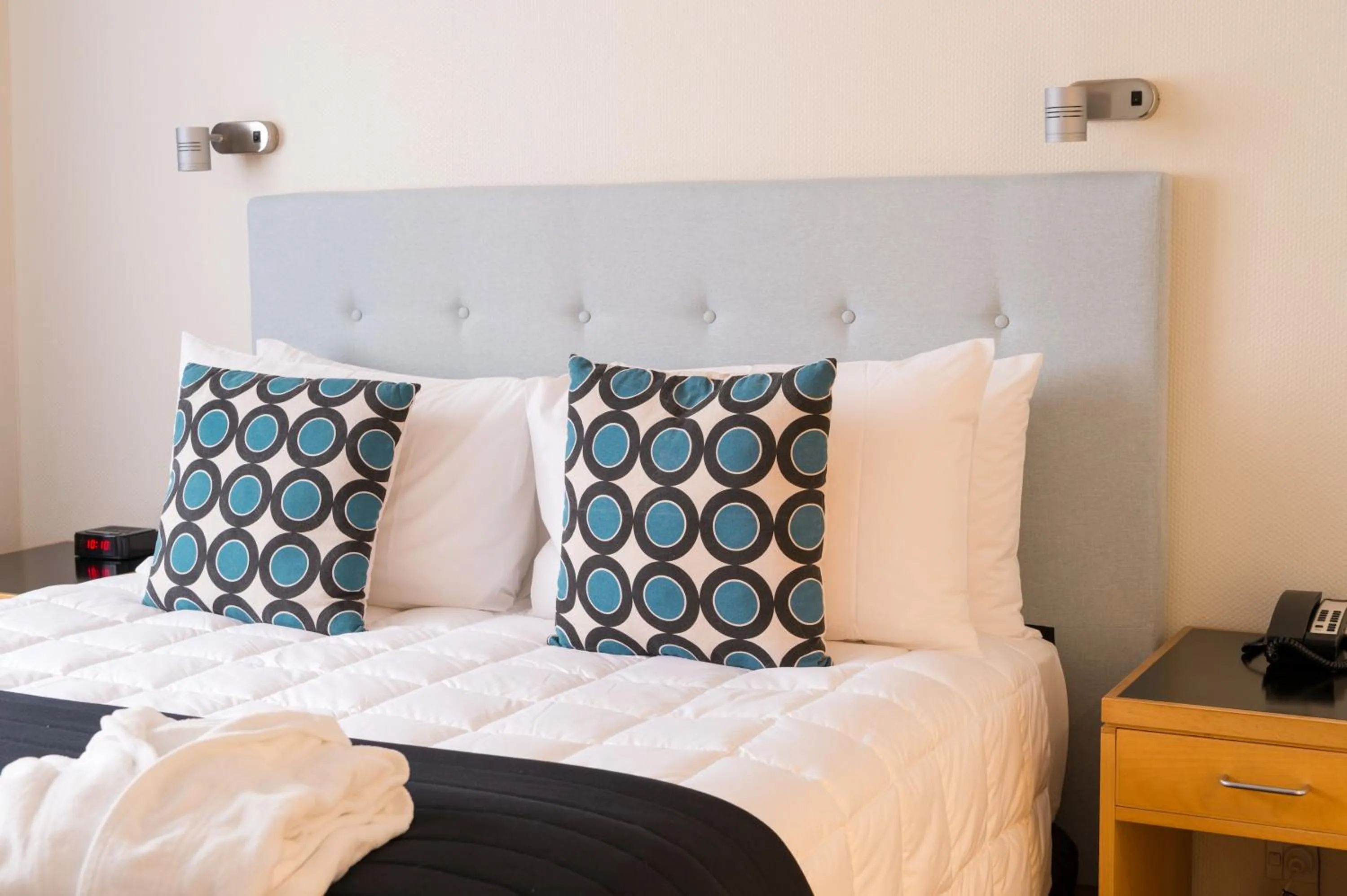 Bed in West Plaza Hotel