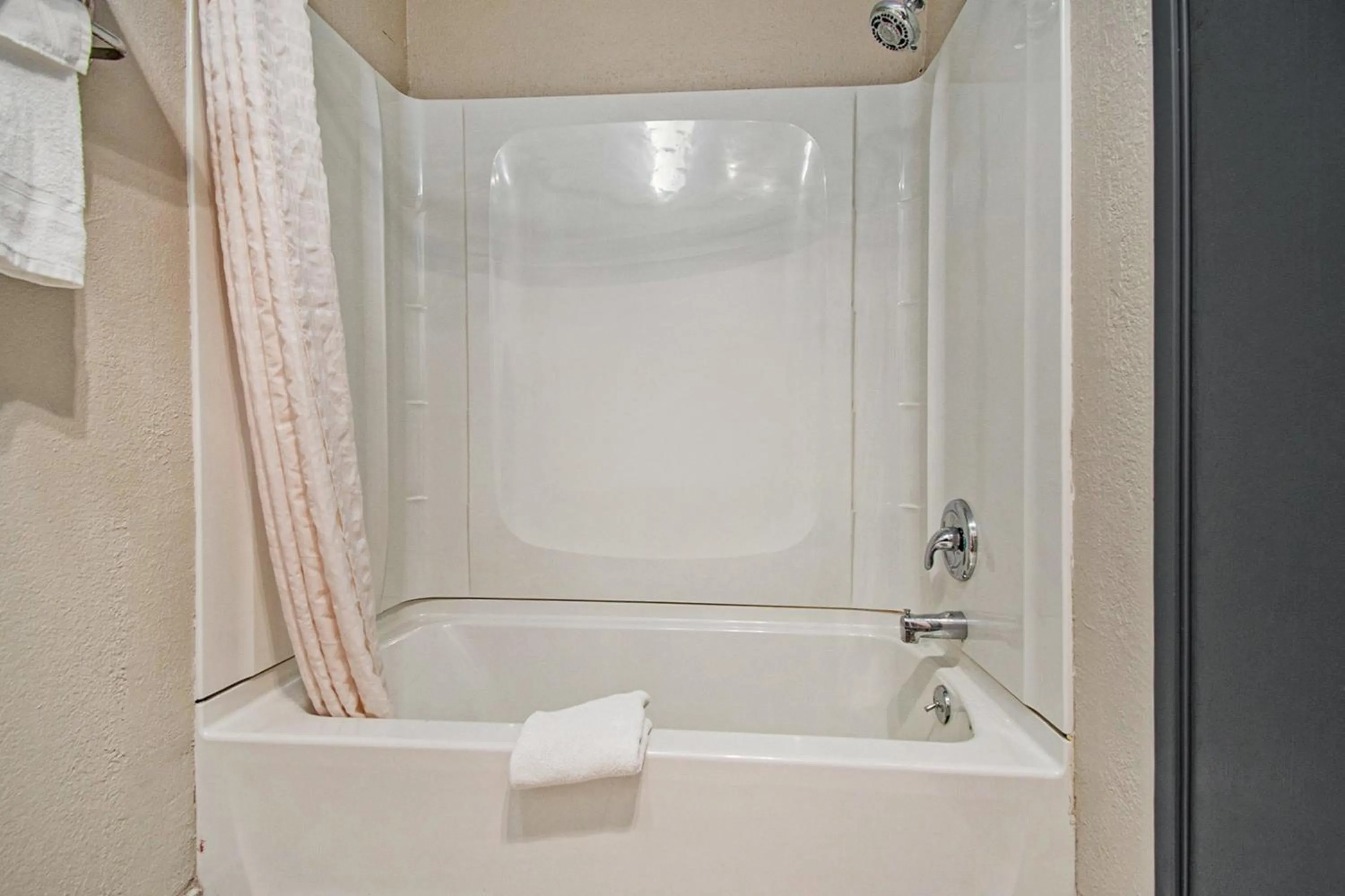 Bathroom in Days Inn & Suites by Wyndham Mt Pleasant