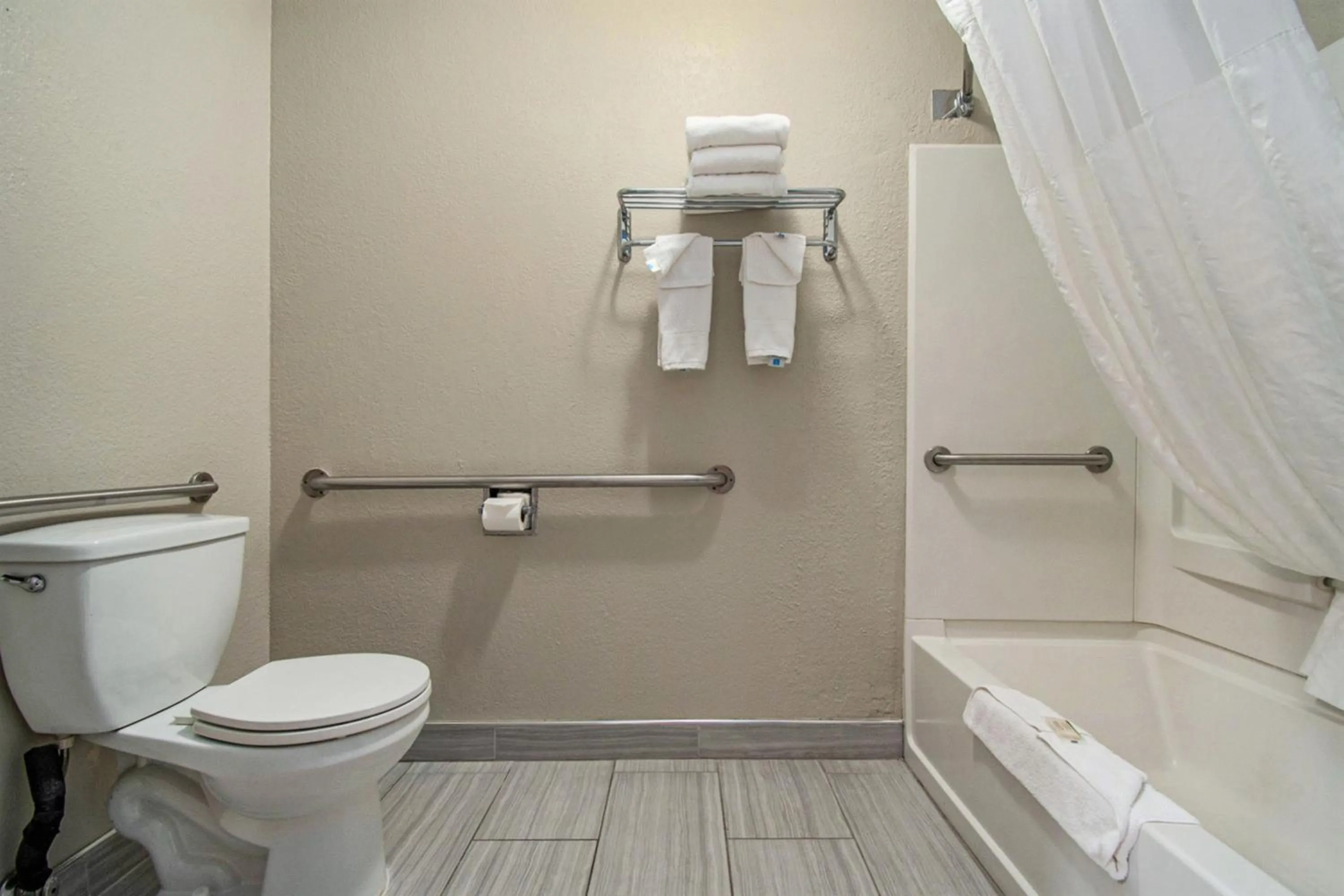 Bathroom in Days Inn & Suites by Wyndham Mt Pleasant