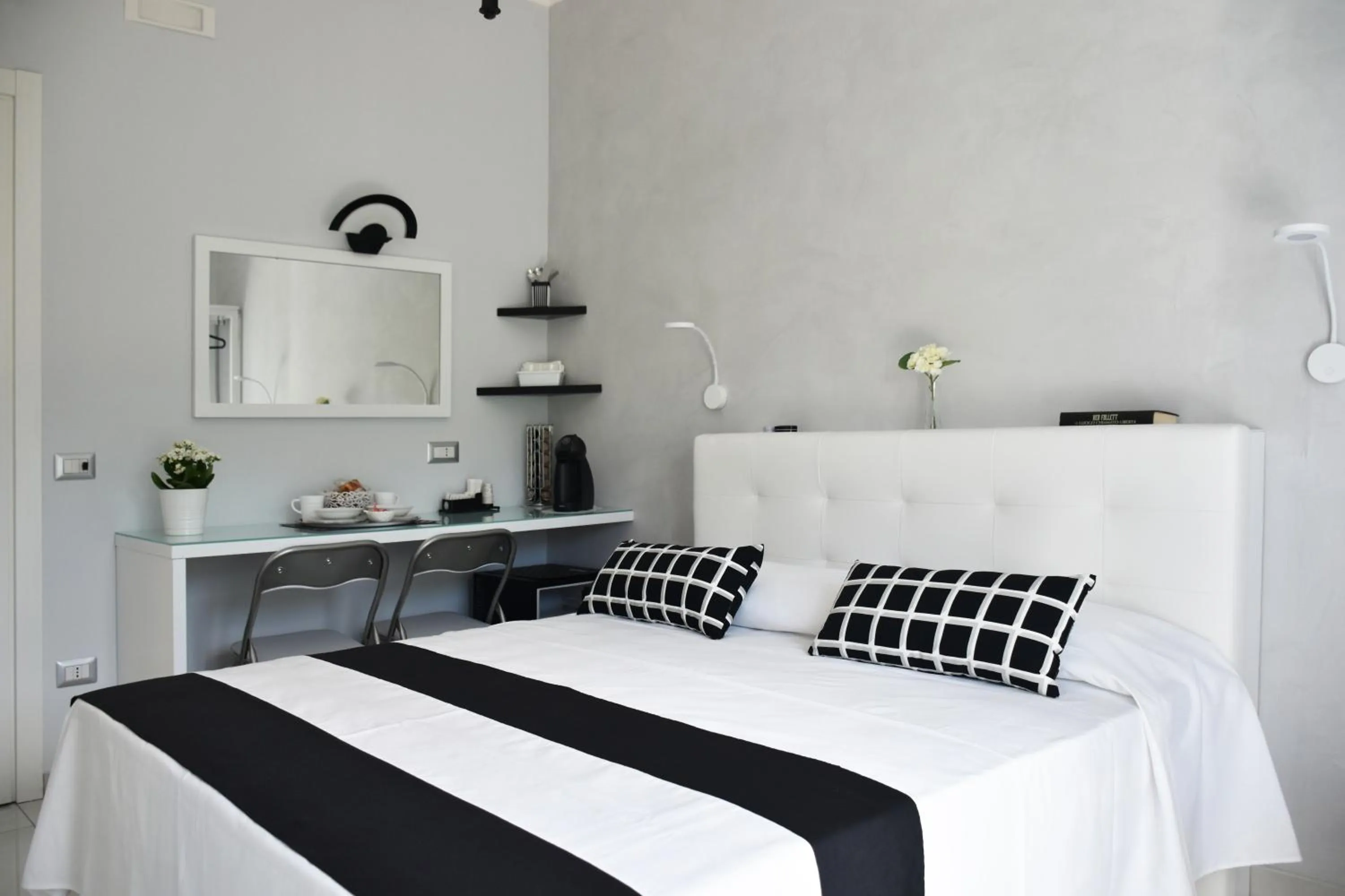 Bed in Costantino Suites