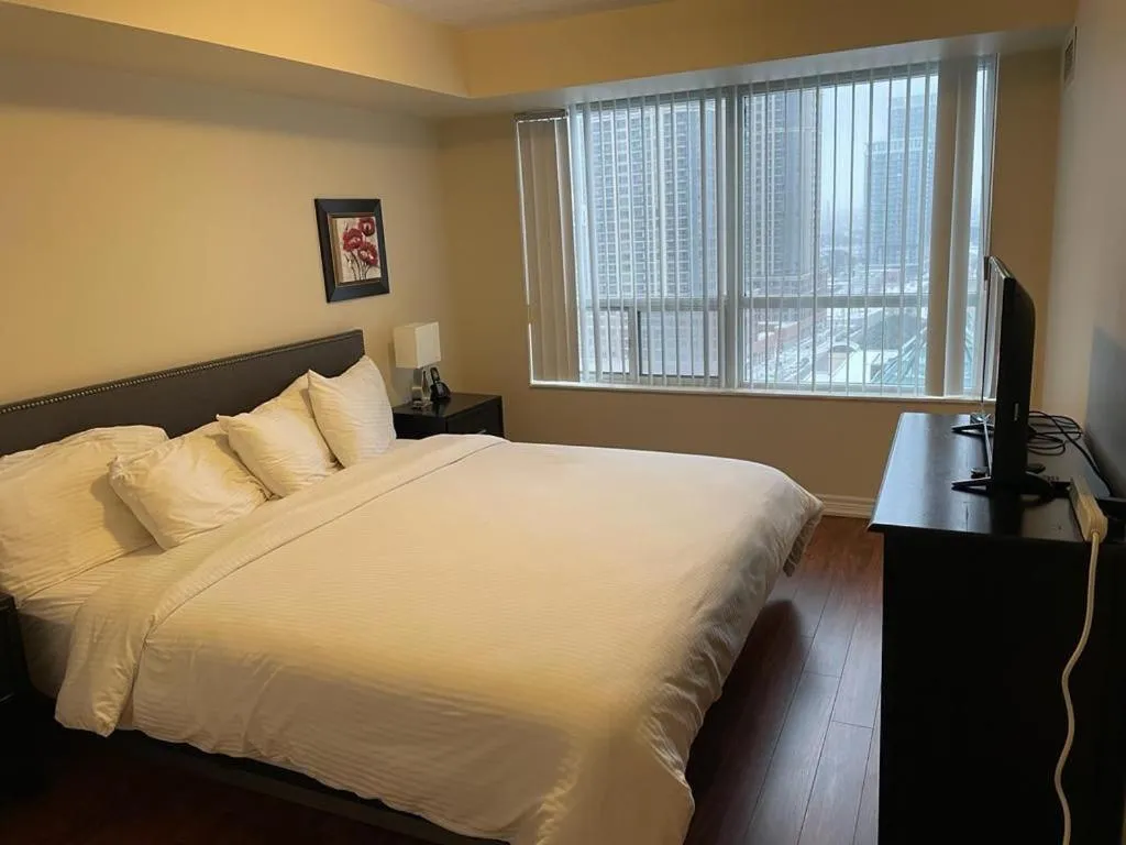 Bed in Platinum Suites Furnished Executive Suites