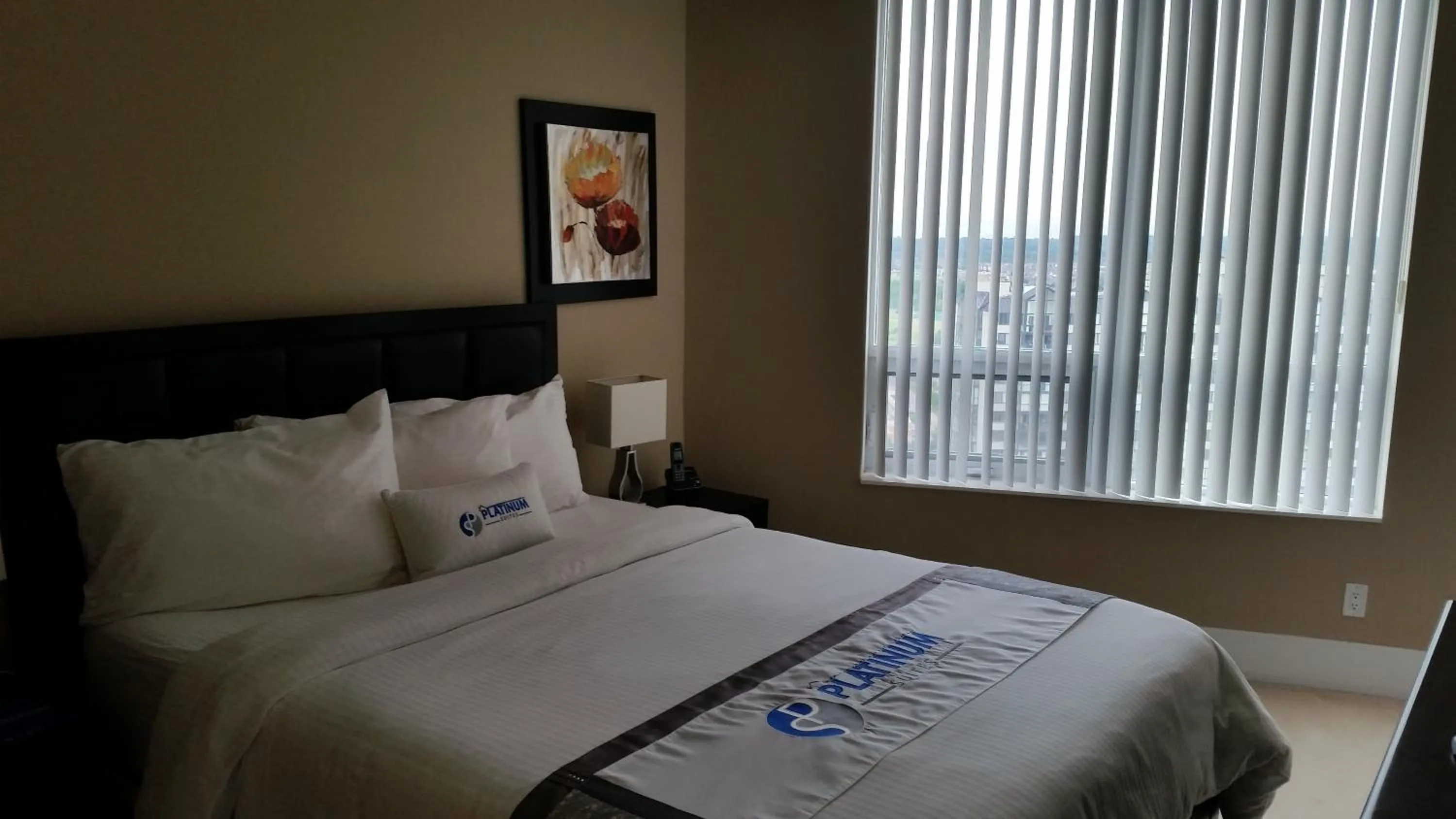 Bed in Platinum Suites Furnished Executive Suites