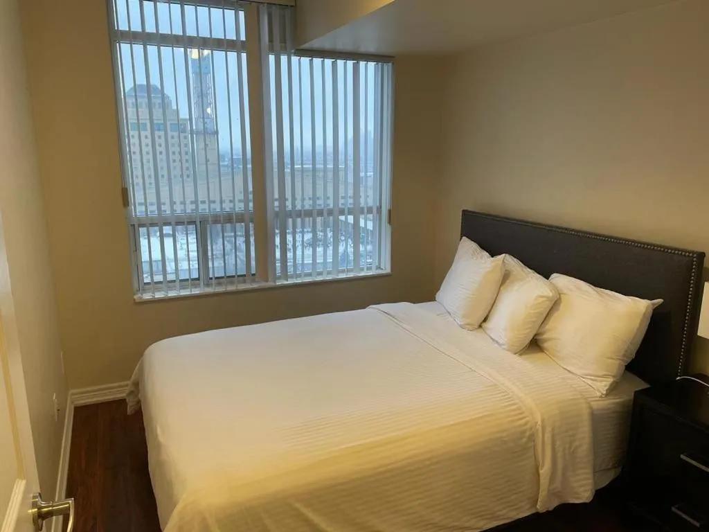 Bed in Platinum Suites Furnished Executive Suites