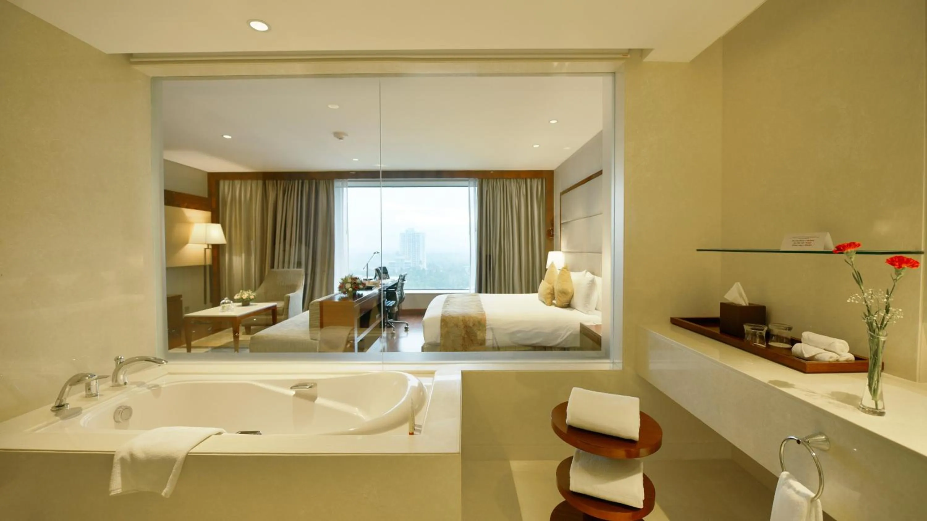 Photo of the whole room, Bed in Crowne Plaza Kochi by IHG