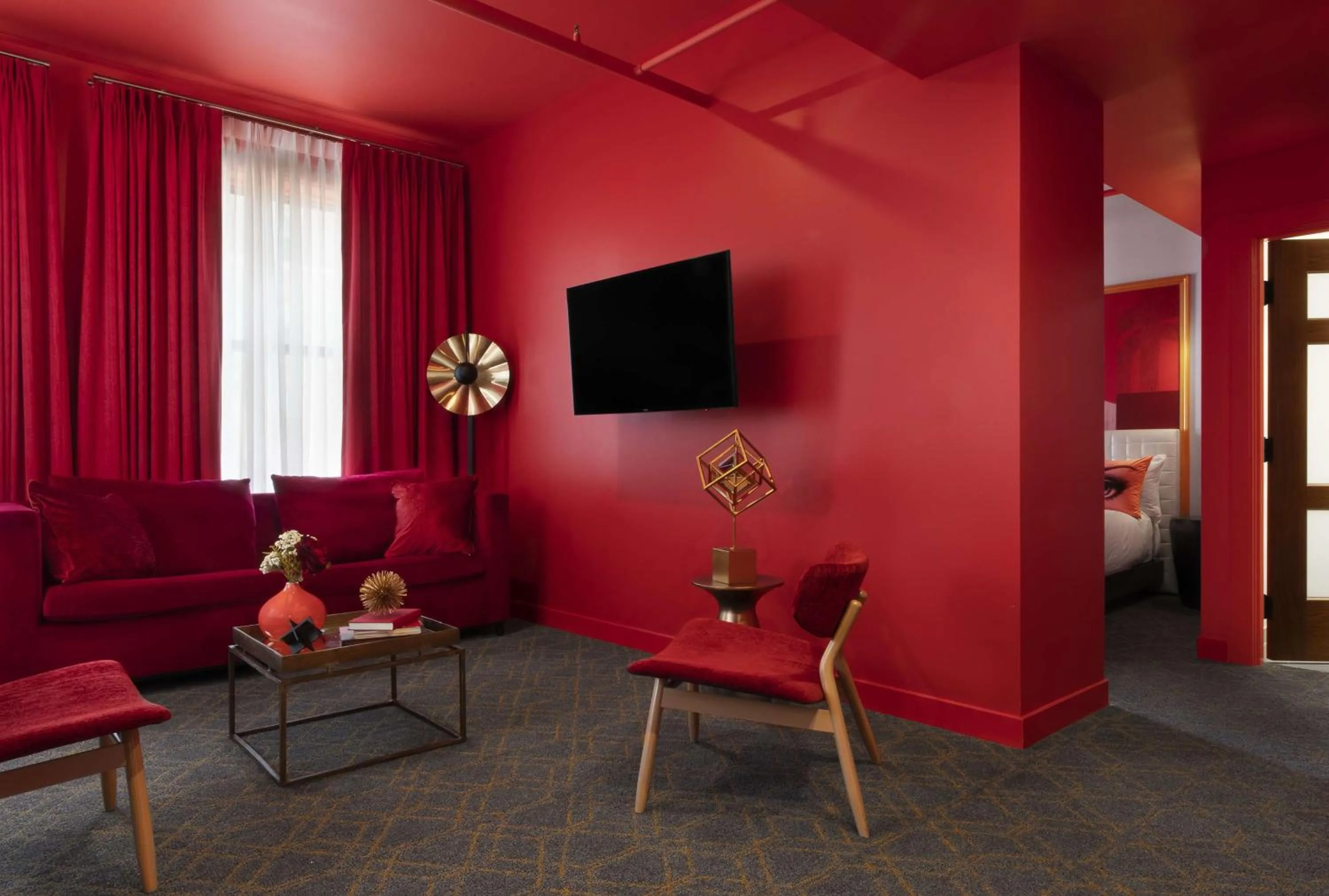 Living room in Angad Arts Hotel St Louis, Tapestry Collection by Hilton