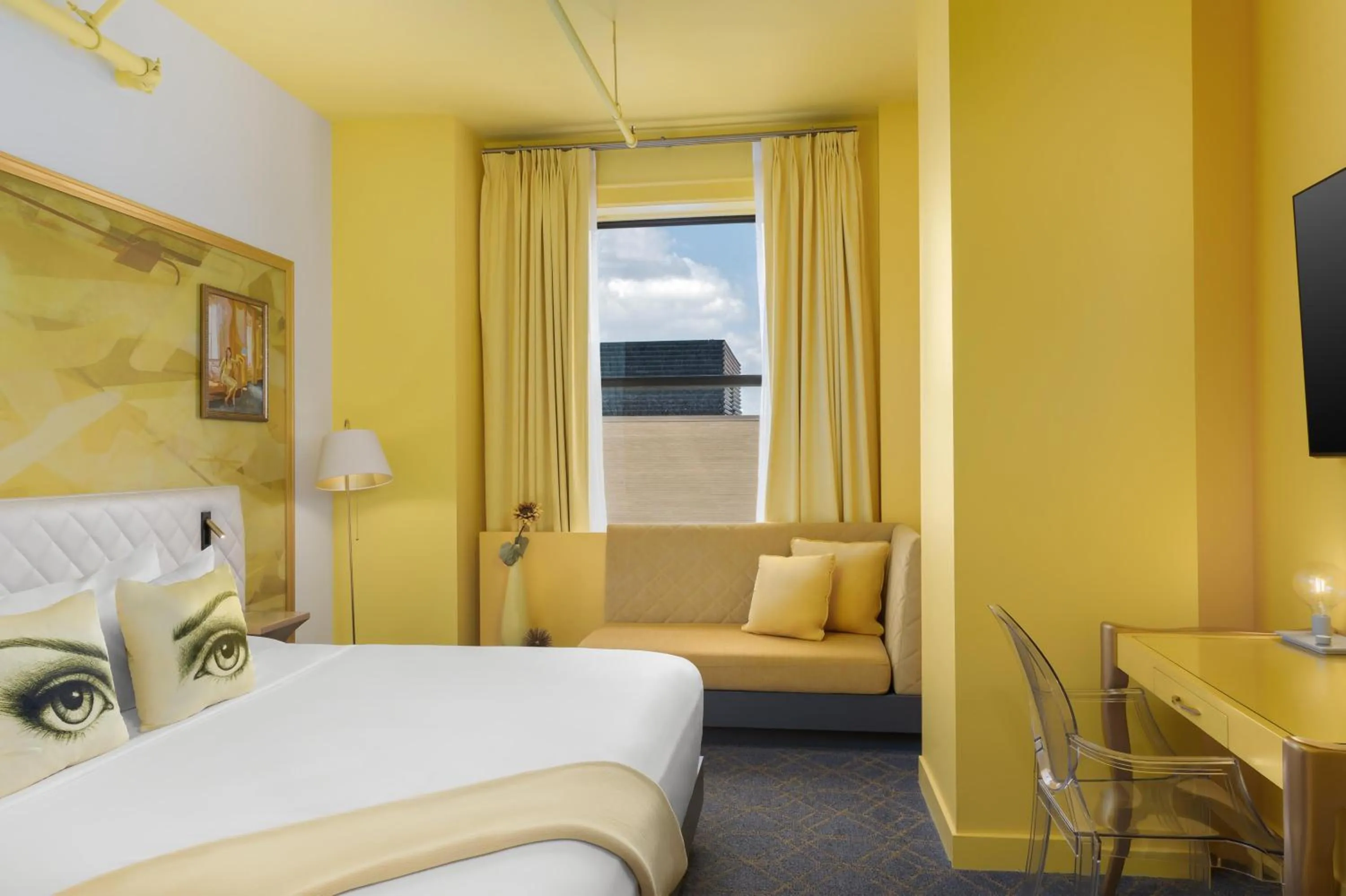 Living room, Bed in Angad Arts Hotel St Louis, Tapestry Collection by Hilton