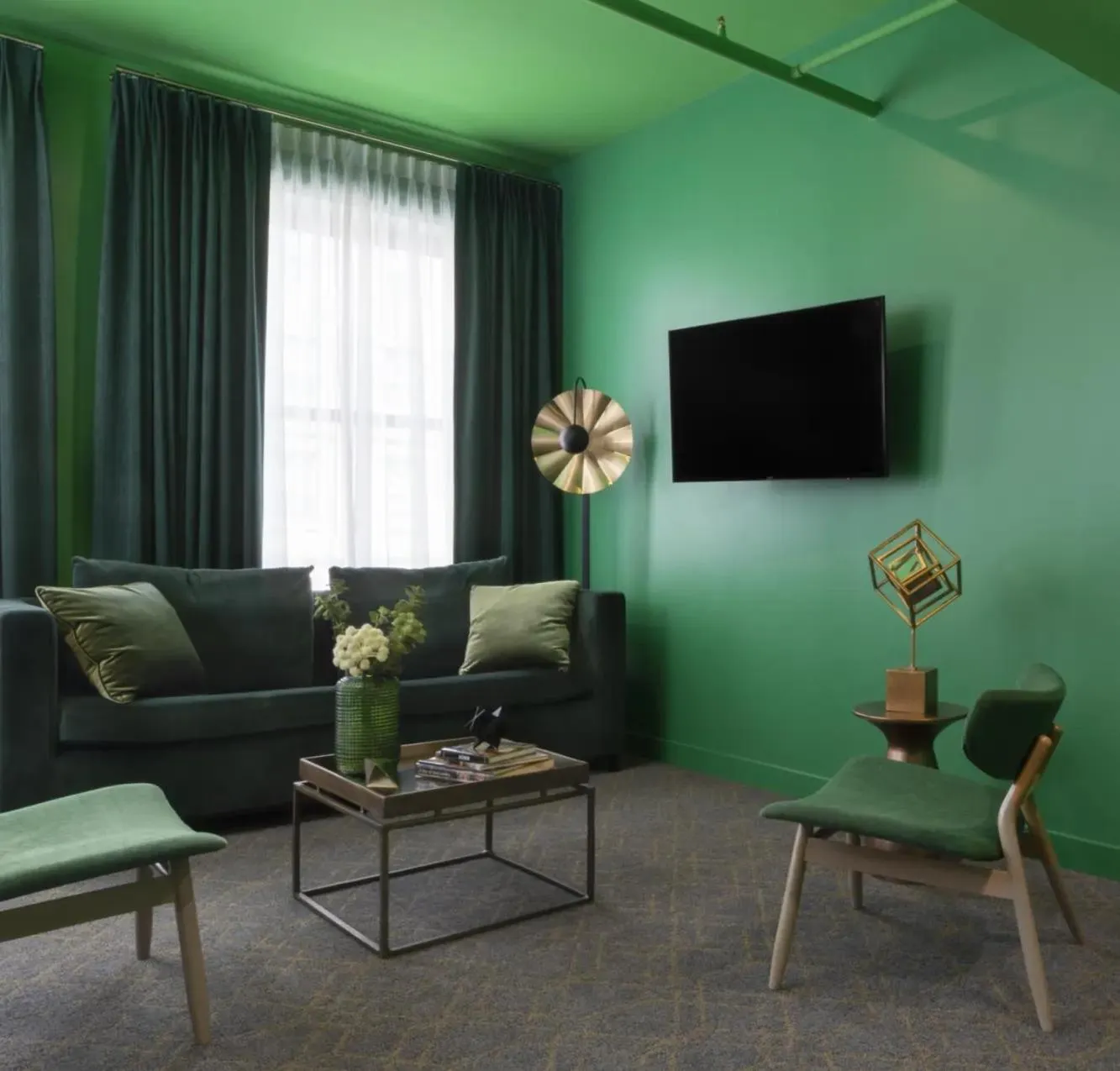 Seating area in Angad Arts Hotel St Louis, Tapestry Collection by Hilton