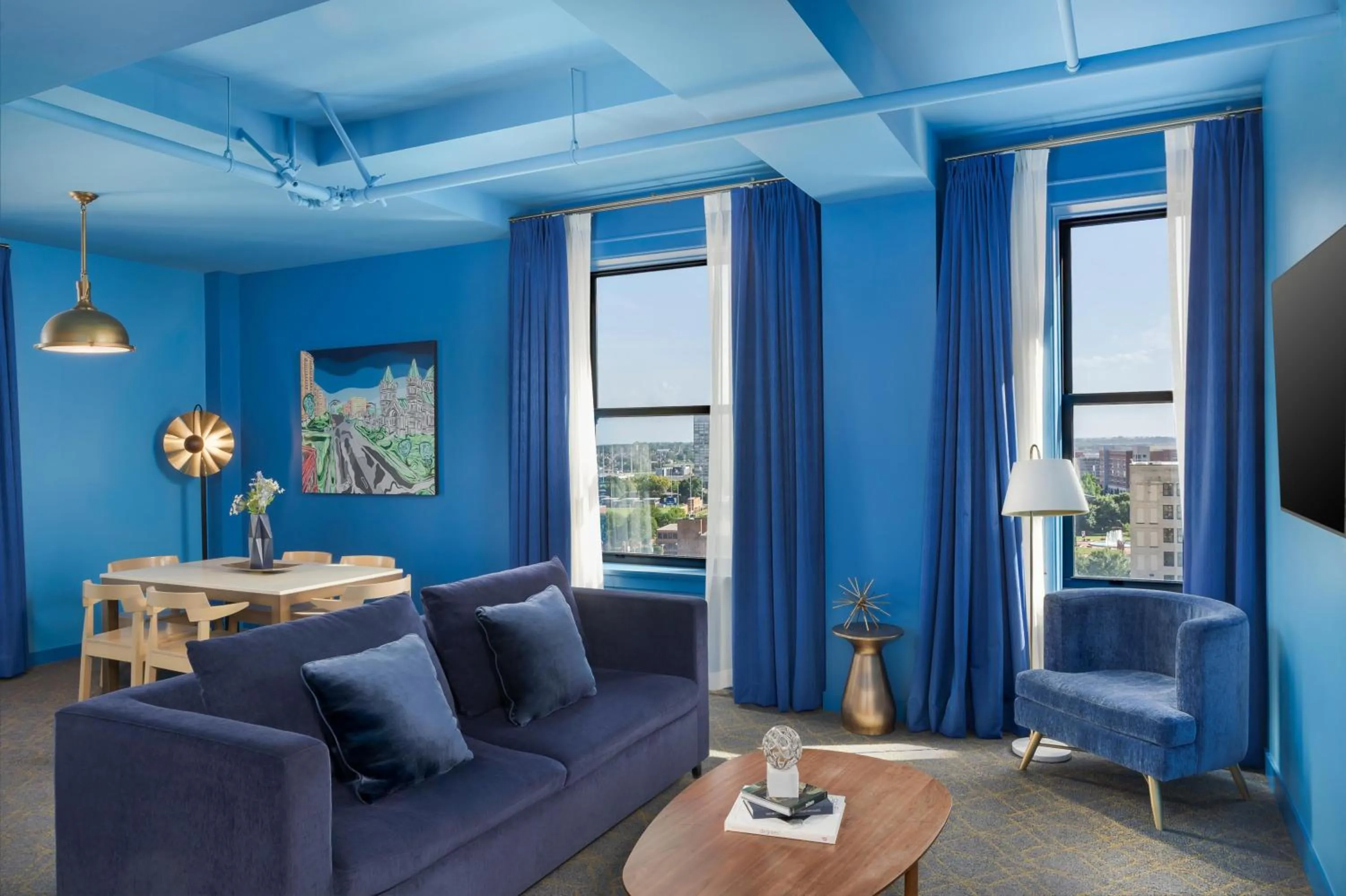 Living room in Angad Arts Hotel St Louis, Tapestry Collection by Hilton