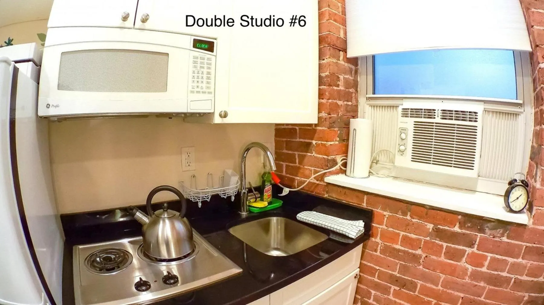 Kitchen or kitchenette in NYC Empire Apartments