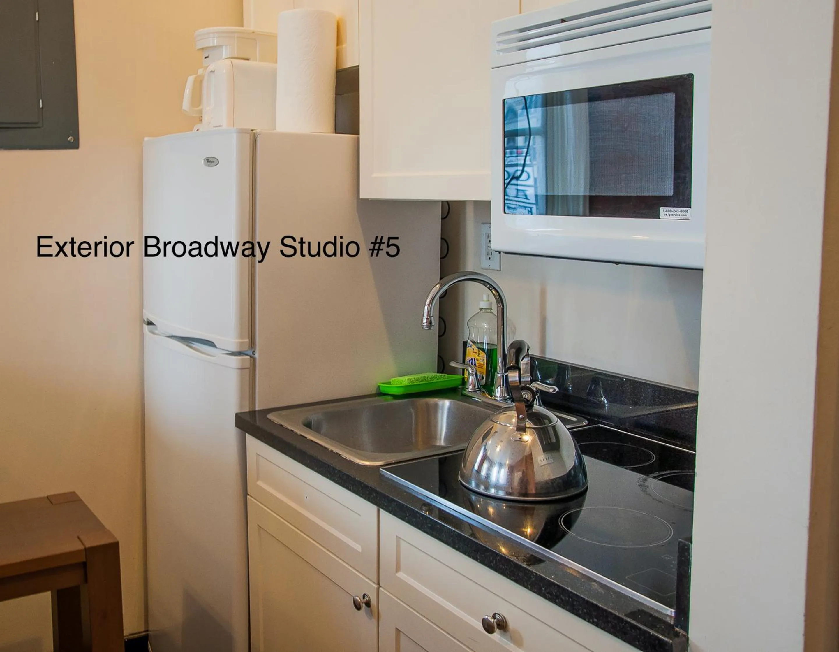 Kitchen or kitchenette in NYC Empire Apartments