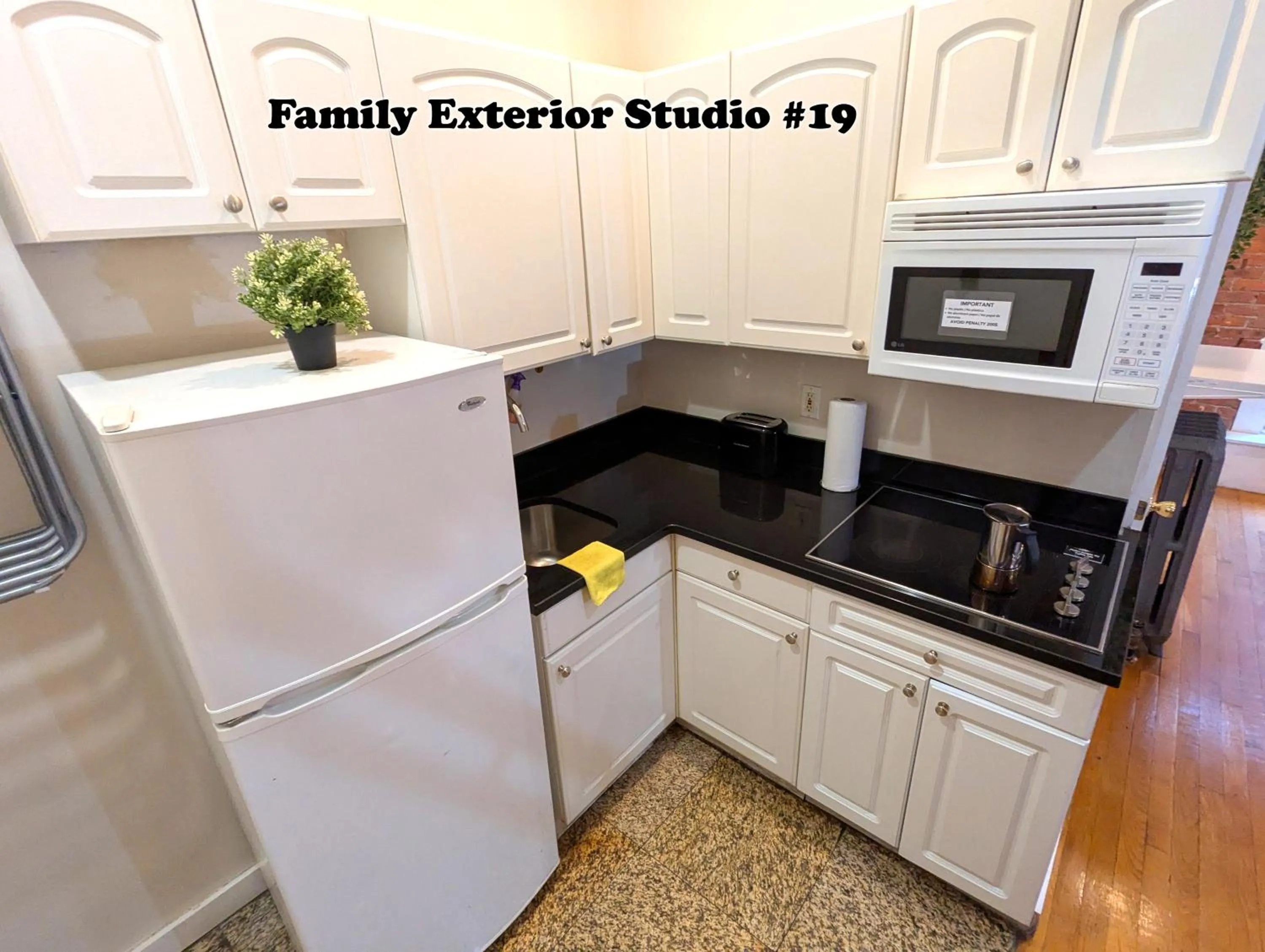 Kitchen or kitchenette in NYC Empire Apartments