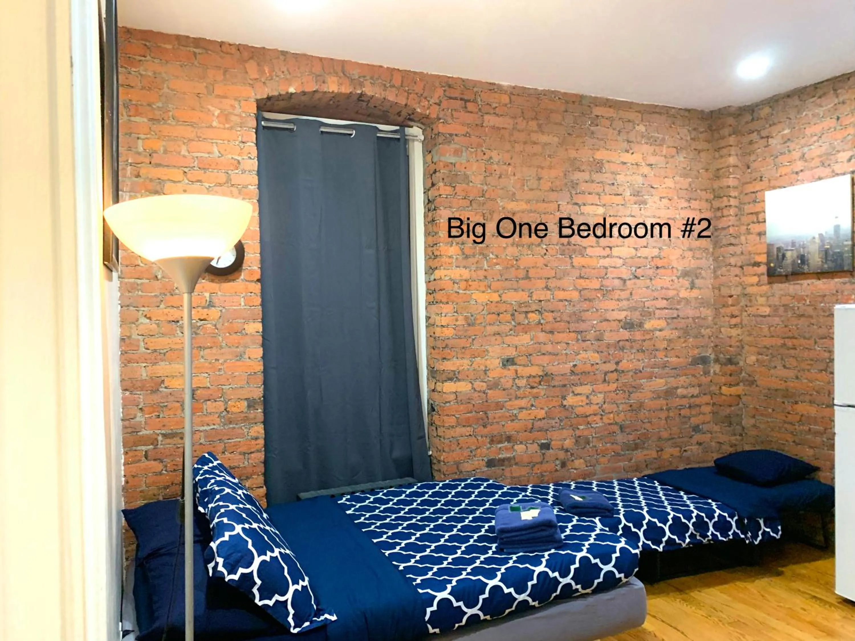 Bed in NYC Empire Apartments