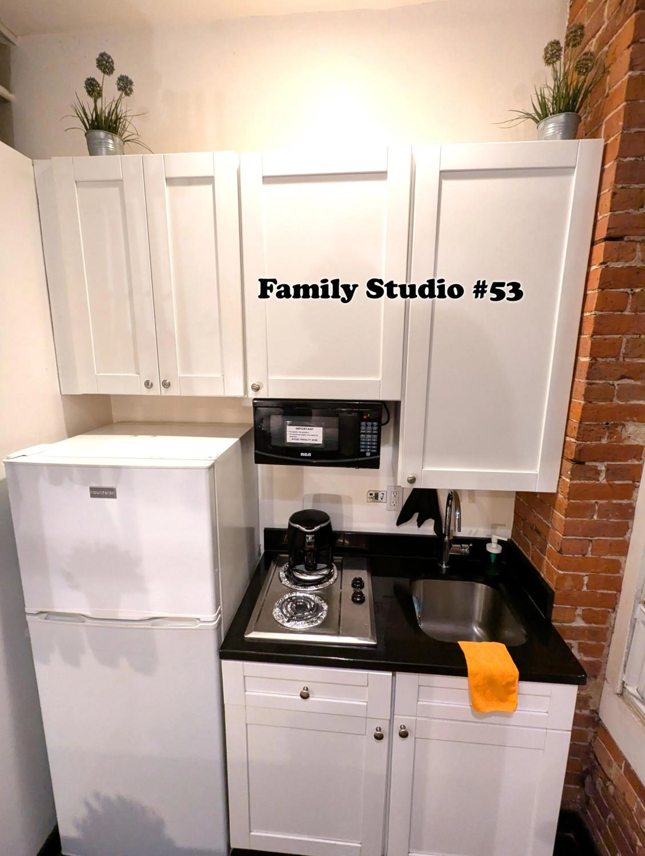 Kitchen or kitchenette in NYC Empire Apartments