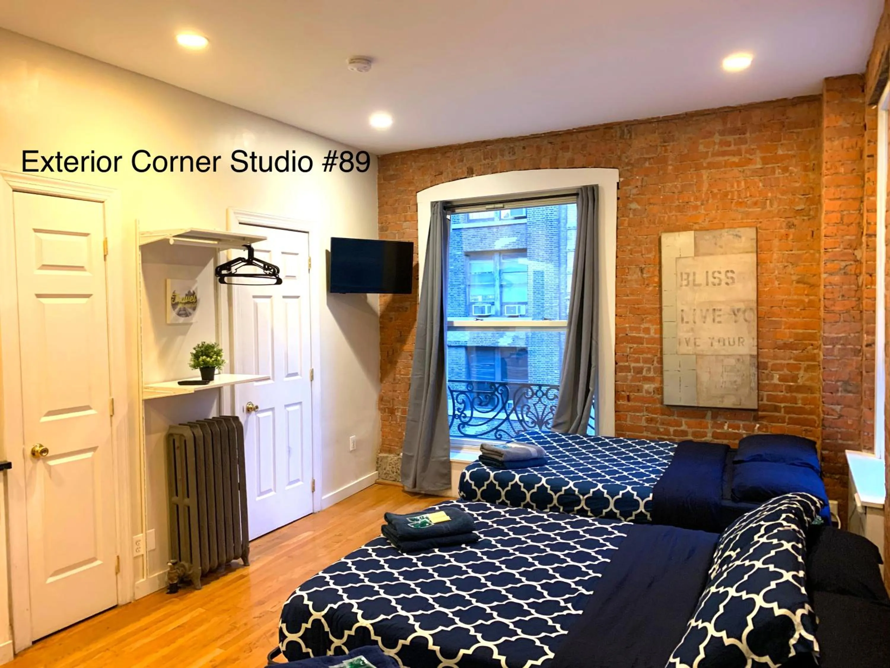 Bed in NYC Empire Apartments