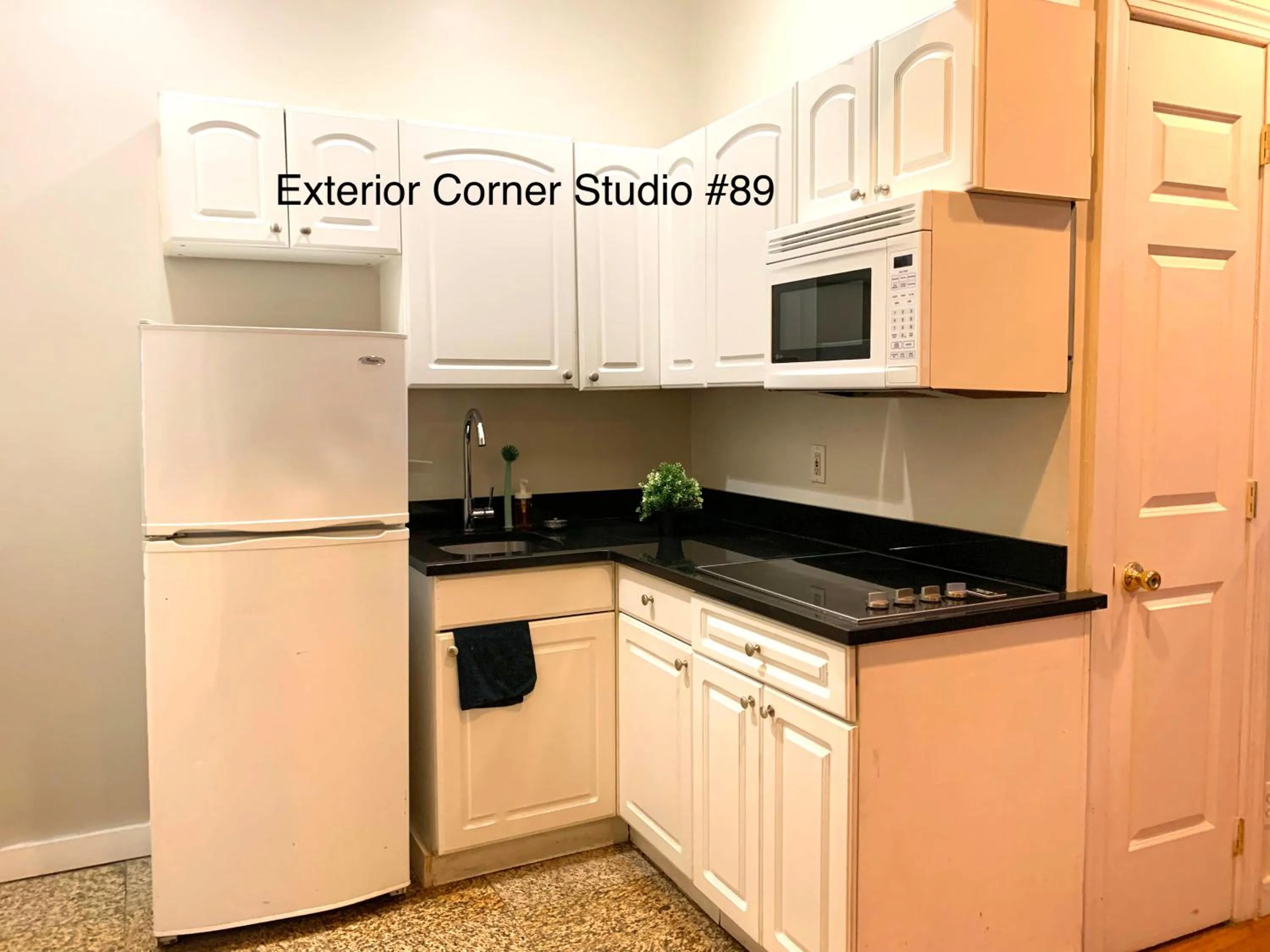 Kitchen or kitchenette in NYC Empire Apartments