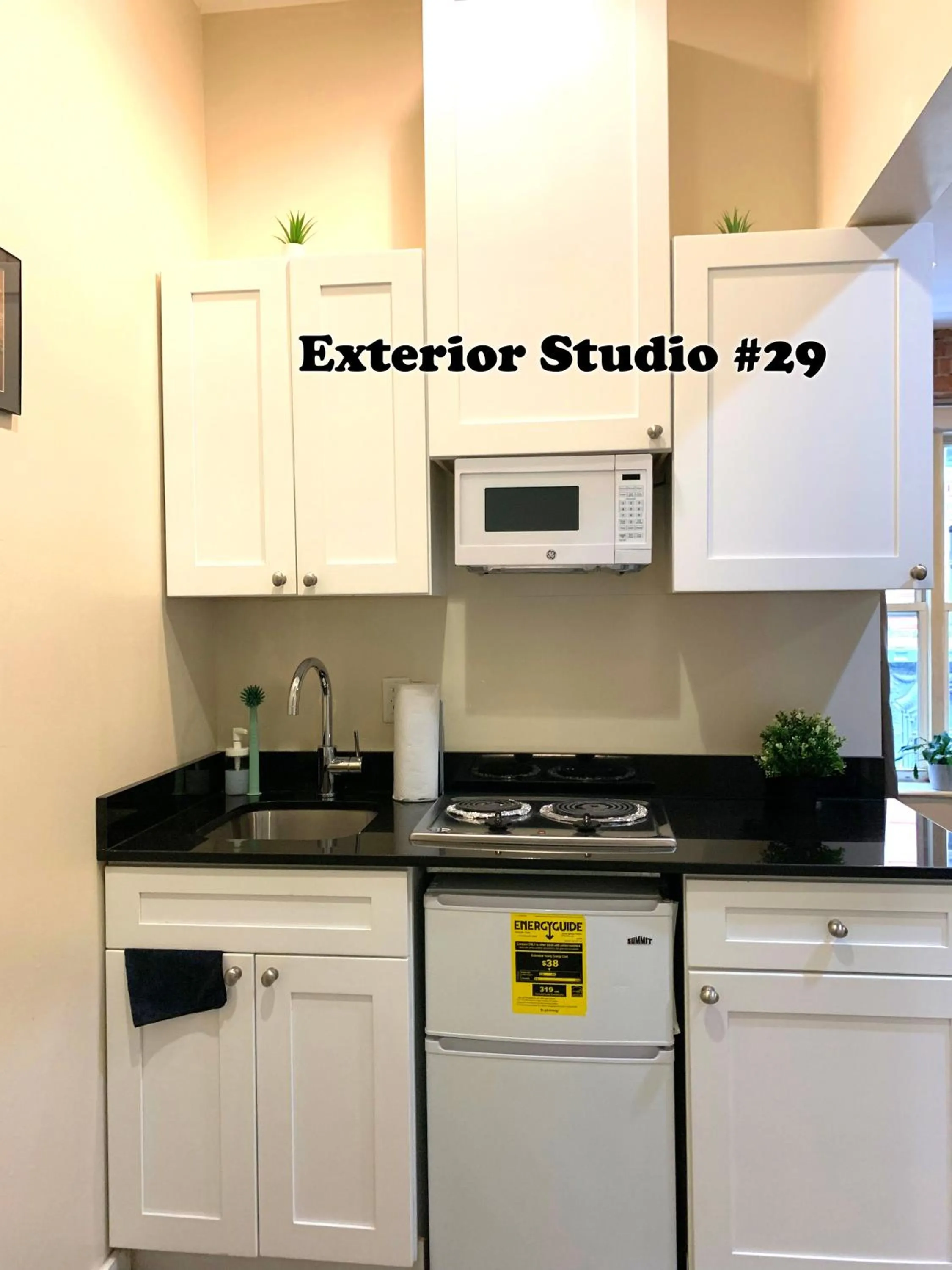 Kitchen or kitchenette in NYC Empire Apartments