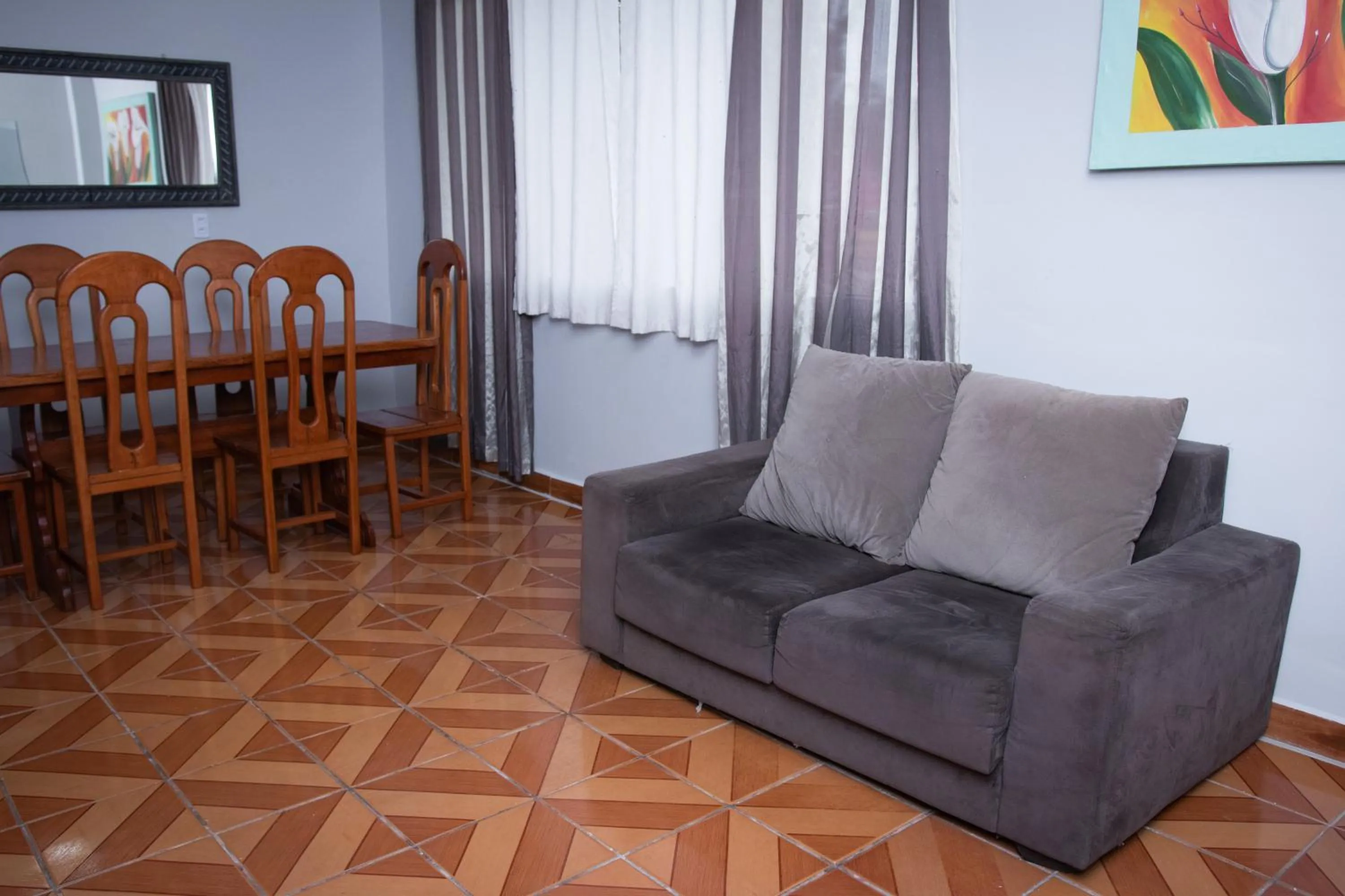 Communal lounge/ TV room in Guajará Palace Hotel