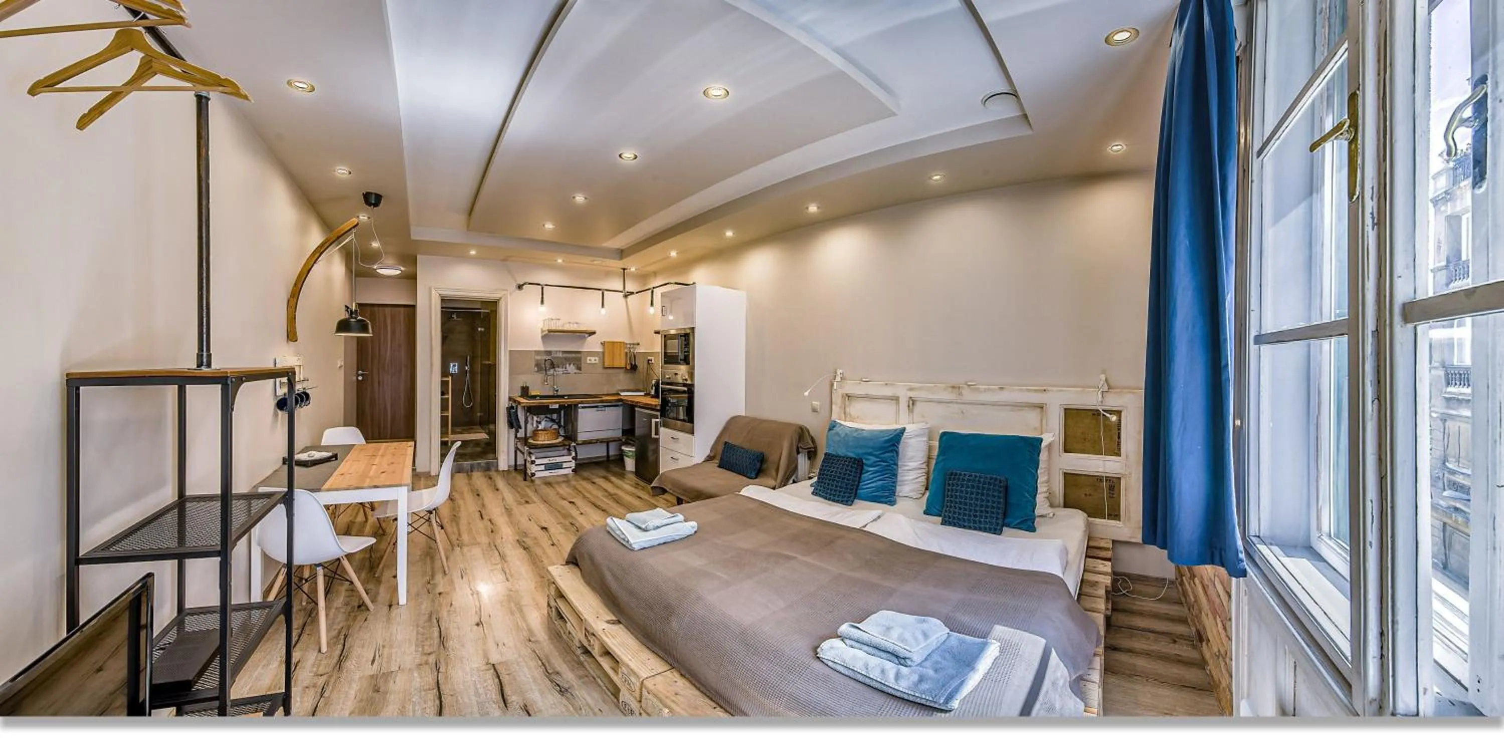 Bed in Downtown Boutique Suite