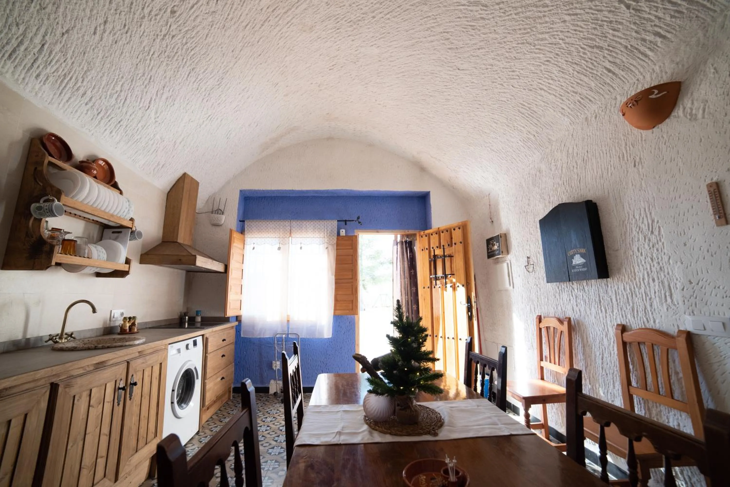 Kitchen or kitchenette in Cuevas Cortijo Gachas