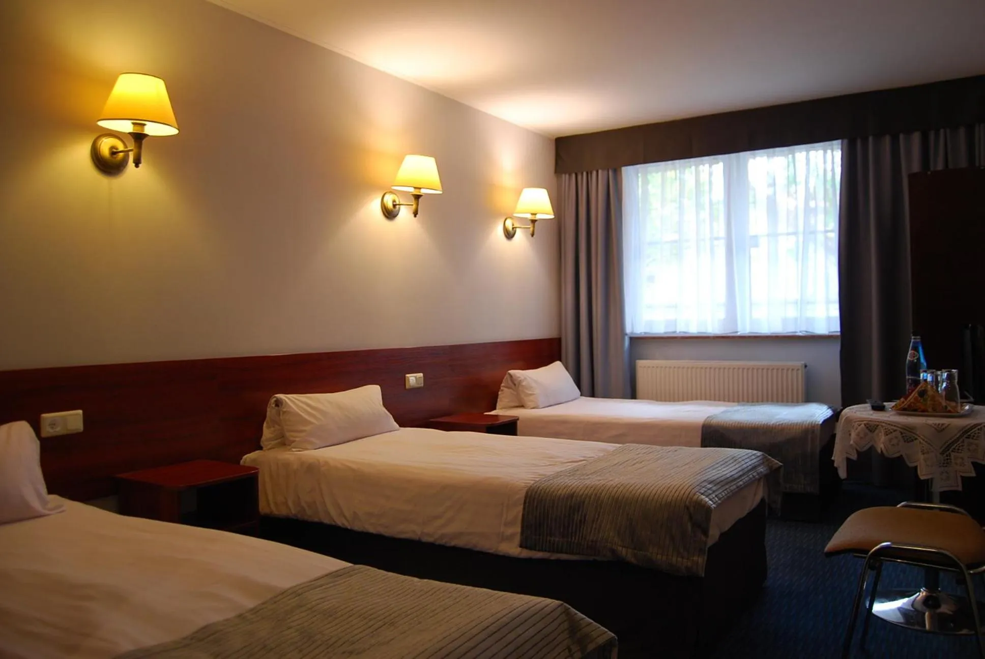 Photo of the whole room, Bed in Amigo Hotel