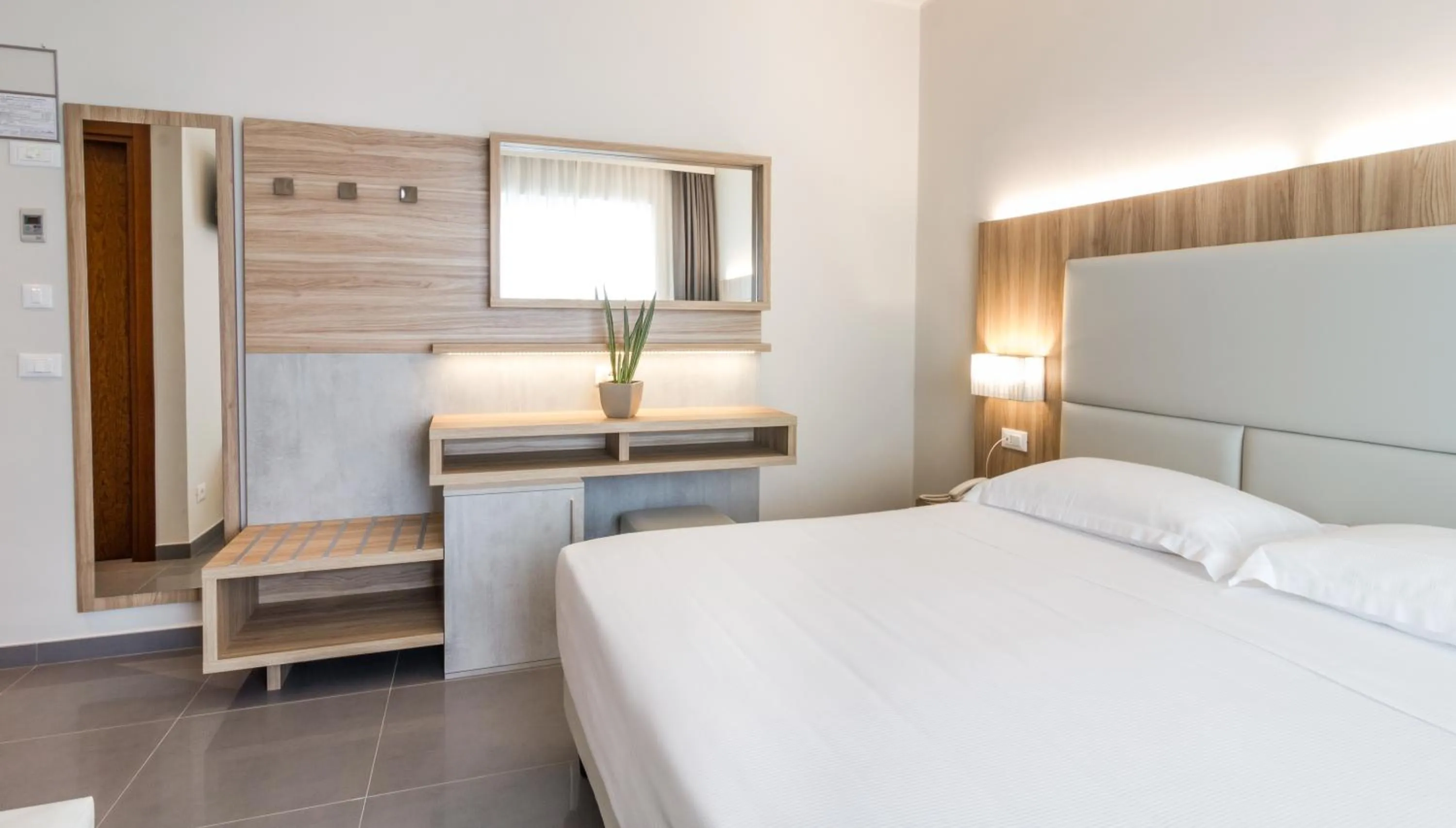 Bed in Hotel Meridiano