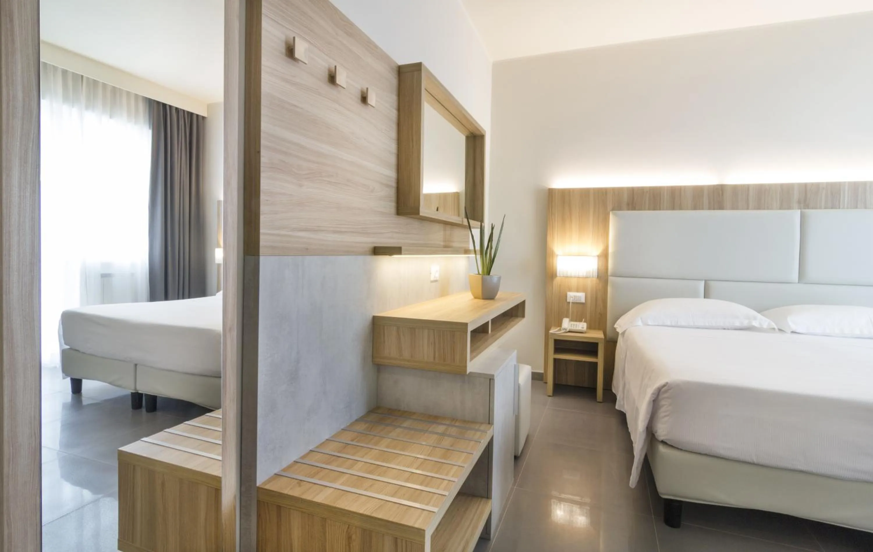 Bed in Hotel Meridiano