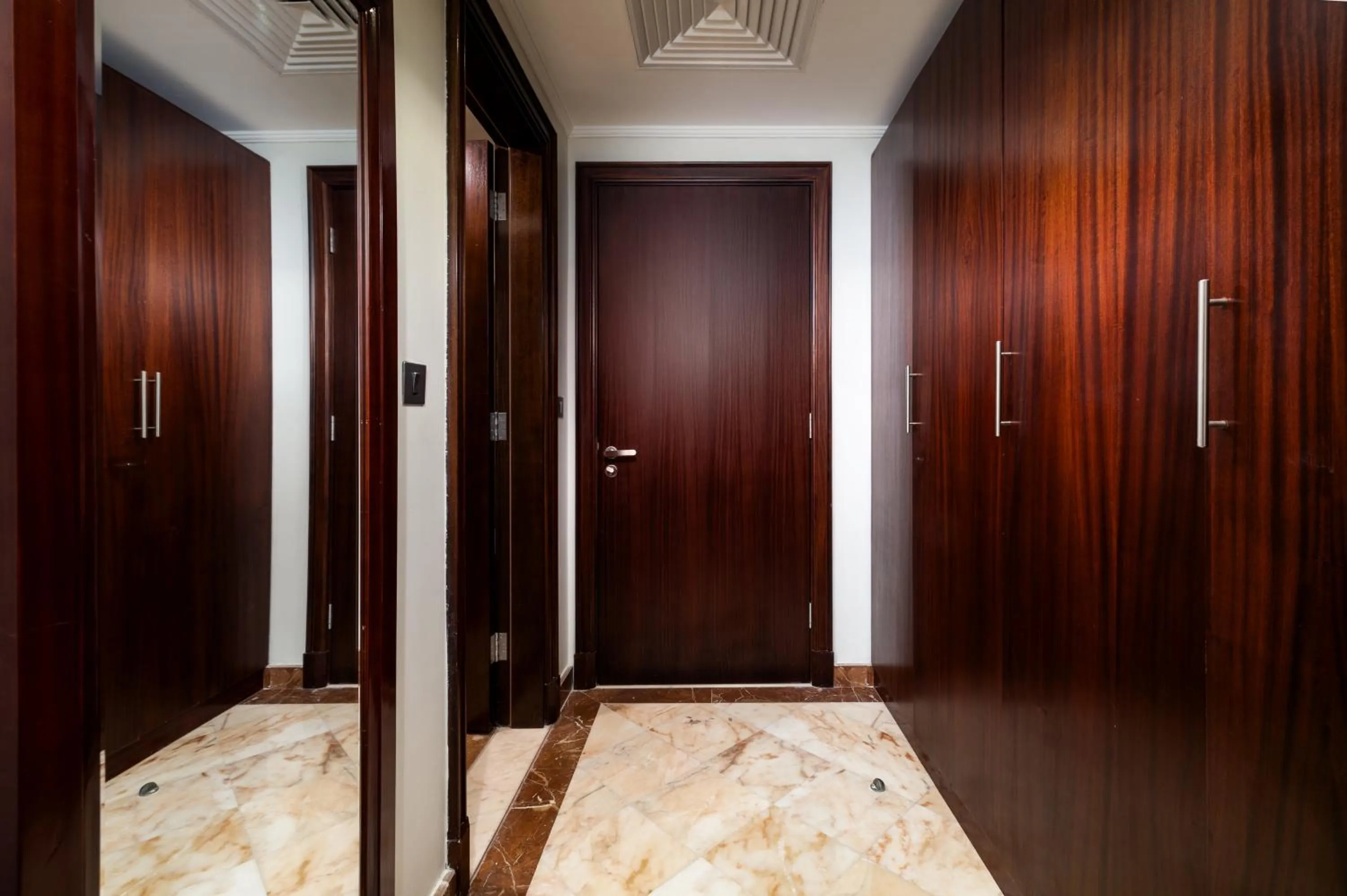 wardrobe, Bed in Emaar Royal Hotel