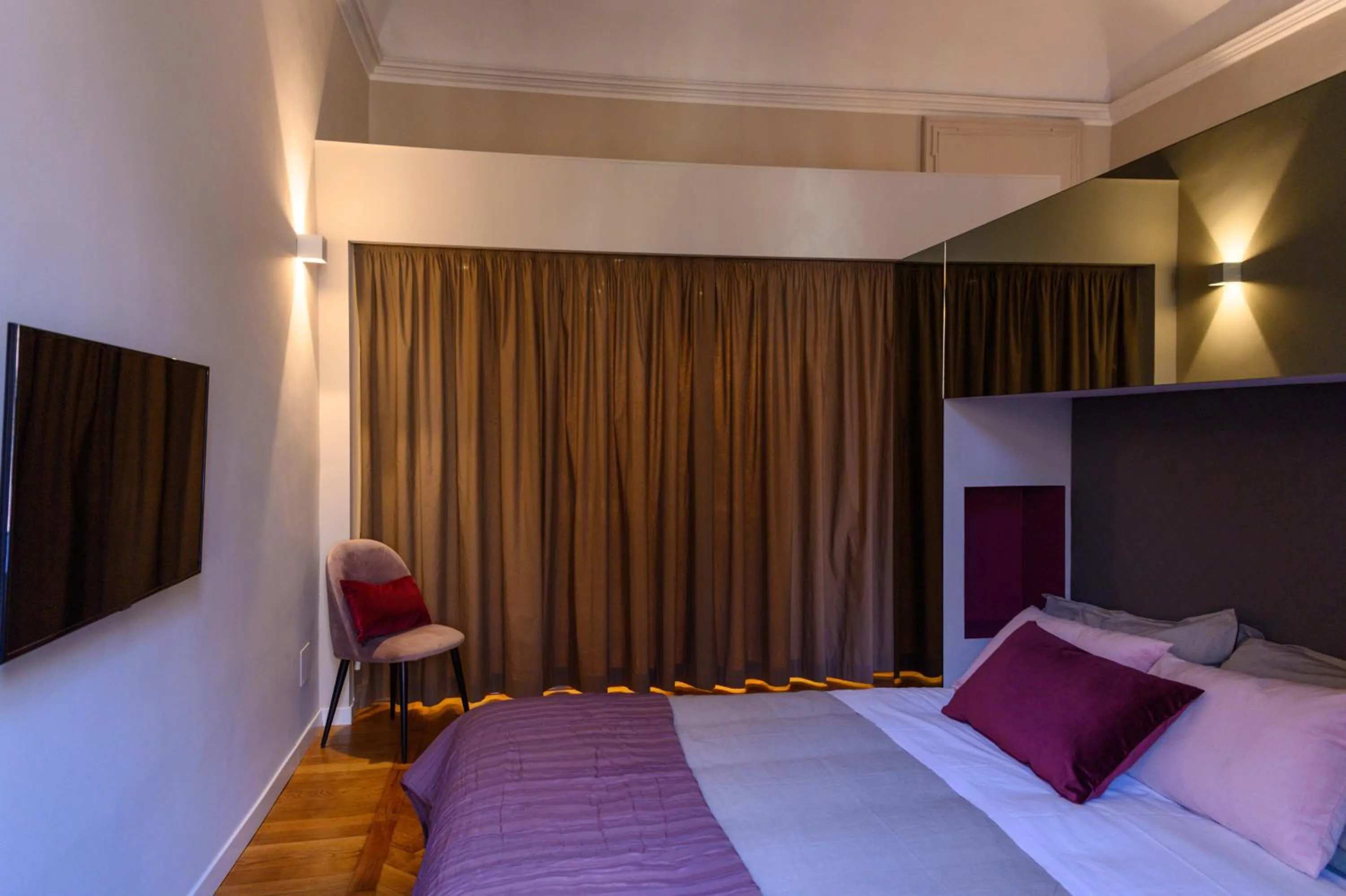 Bed in Savoia Suites Torino