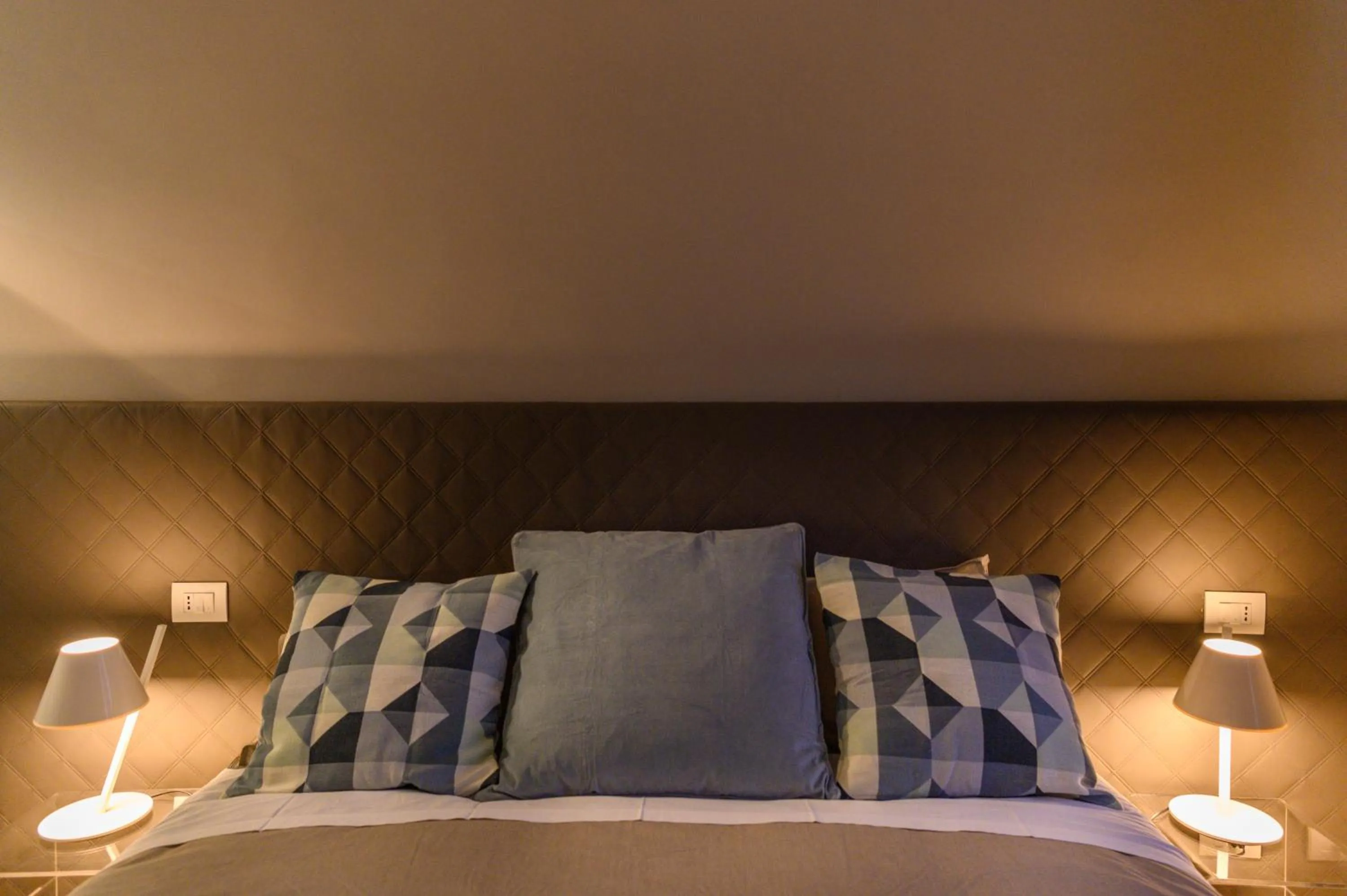 Bed in Savoia Suites Torino