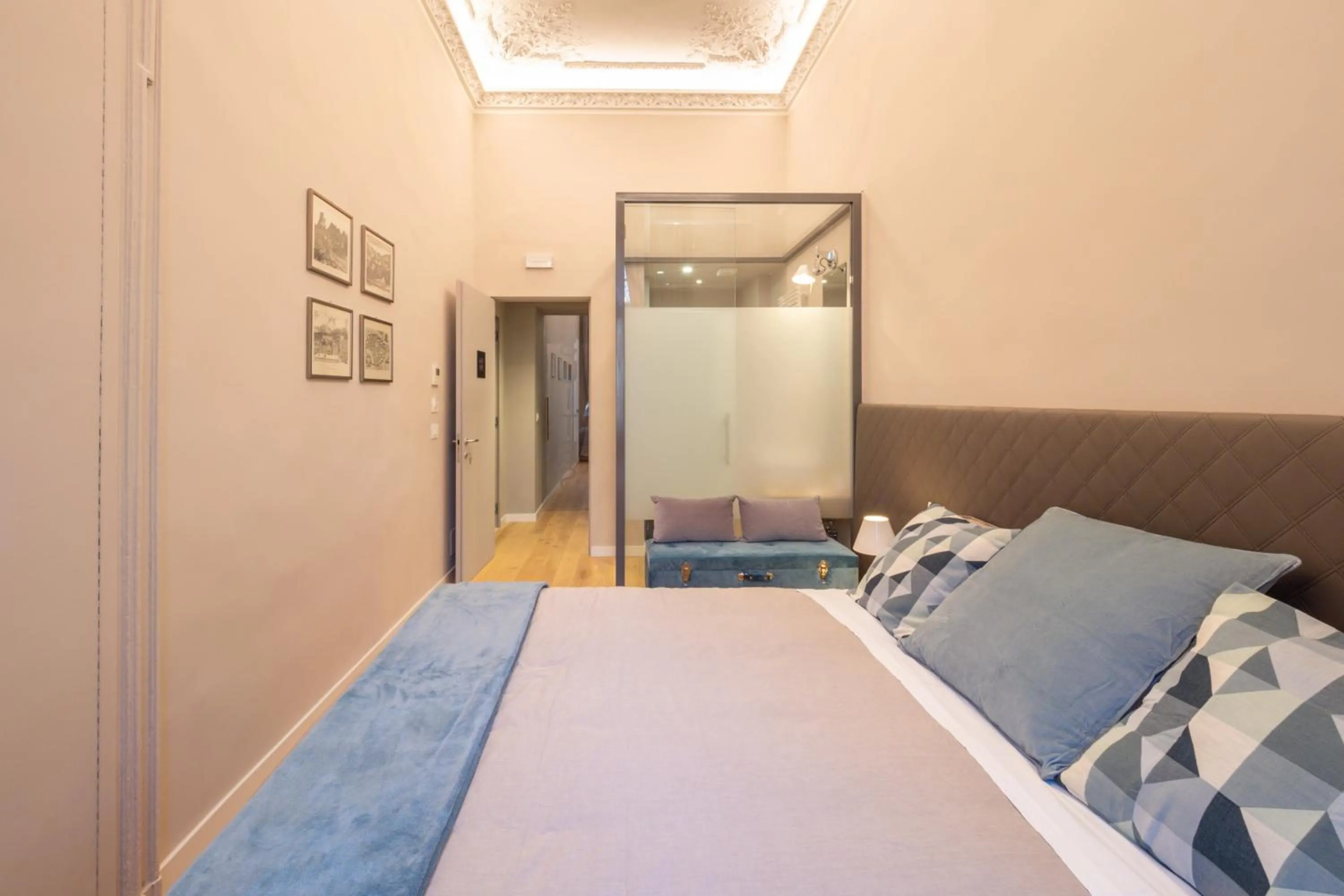 Bed in Savoia Suites Torino