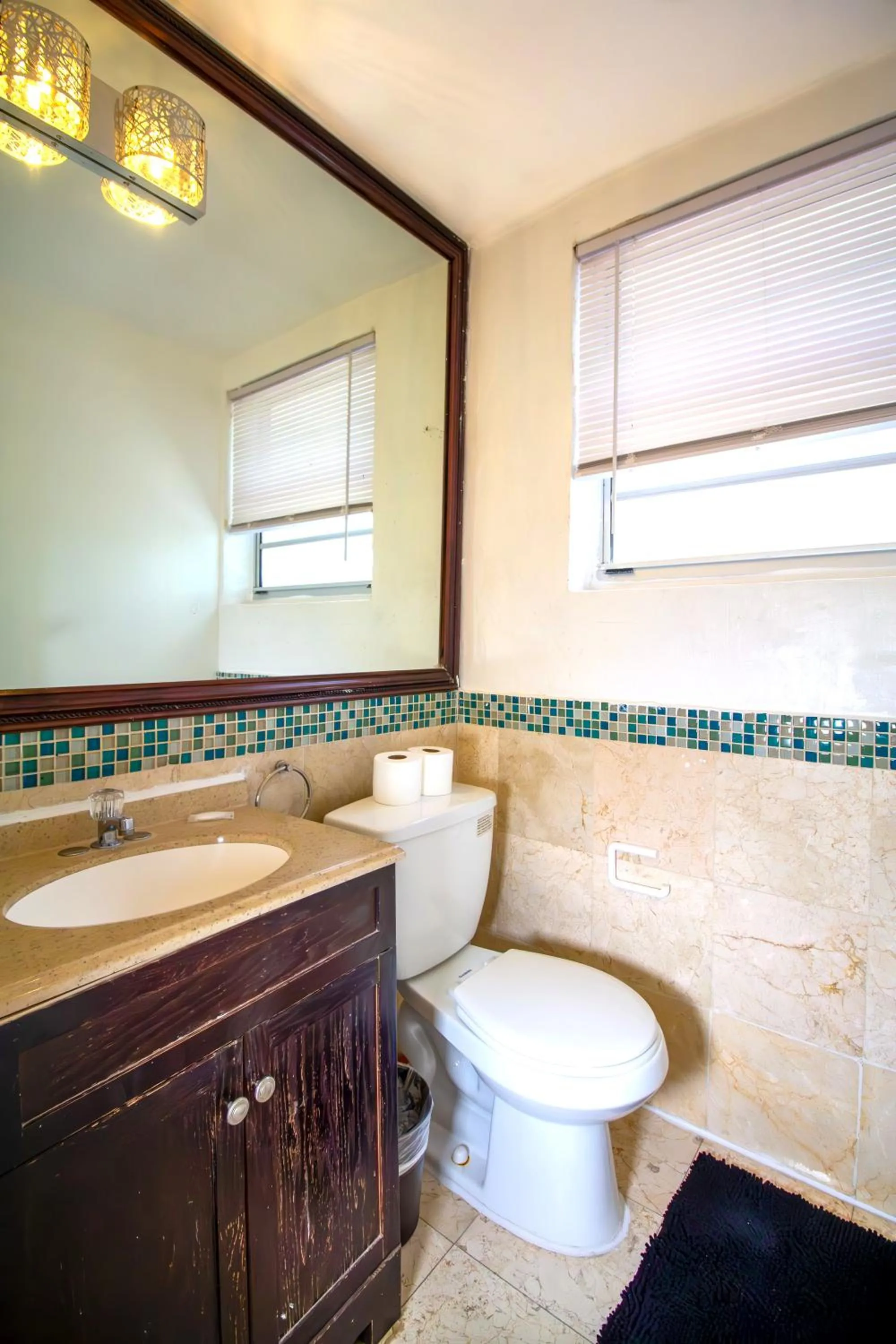 Toilet in L'Etoile Apartments Part of the Oasis Casita Collection