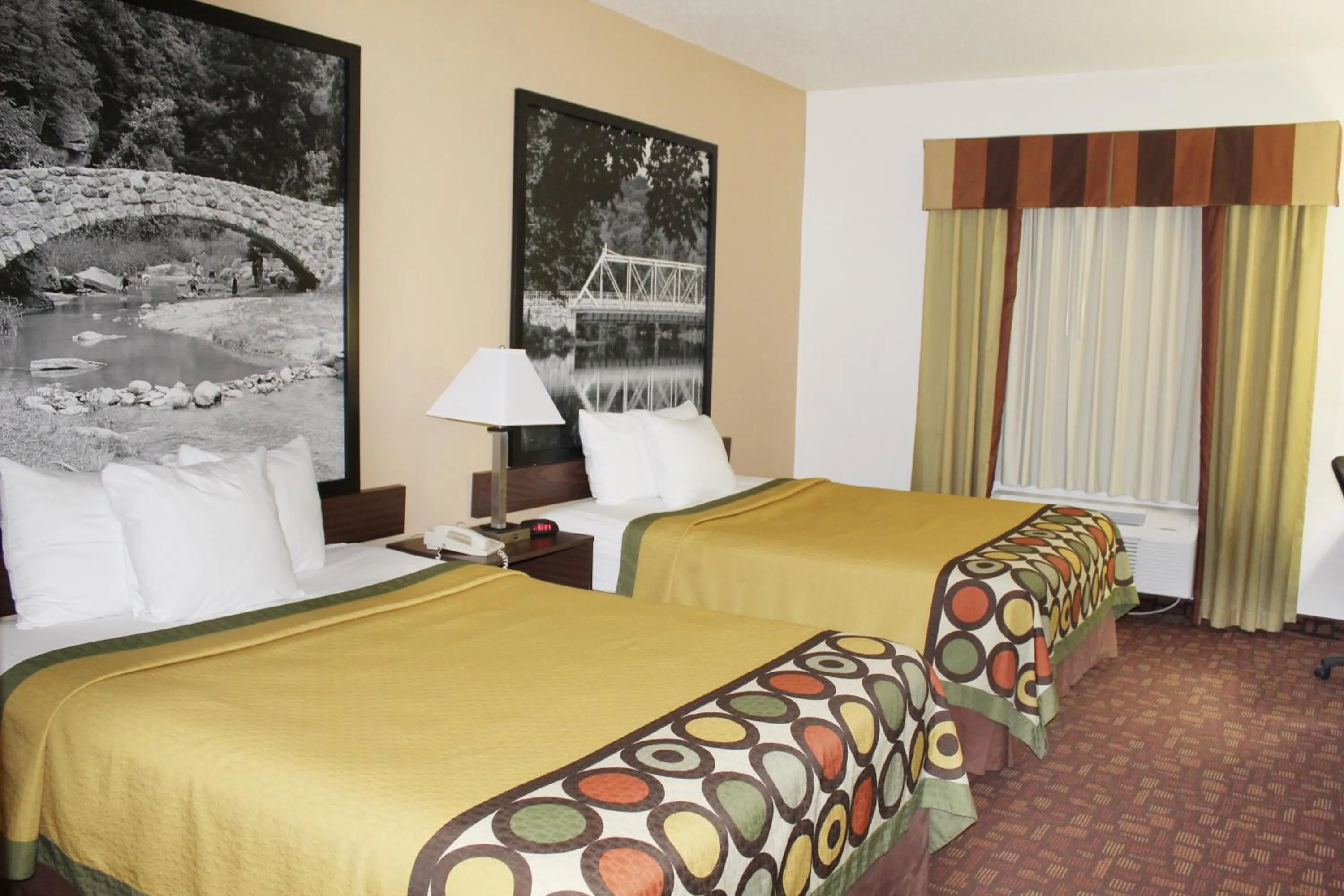 Bed in Super 8 by Wyndham Three Rivers