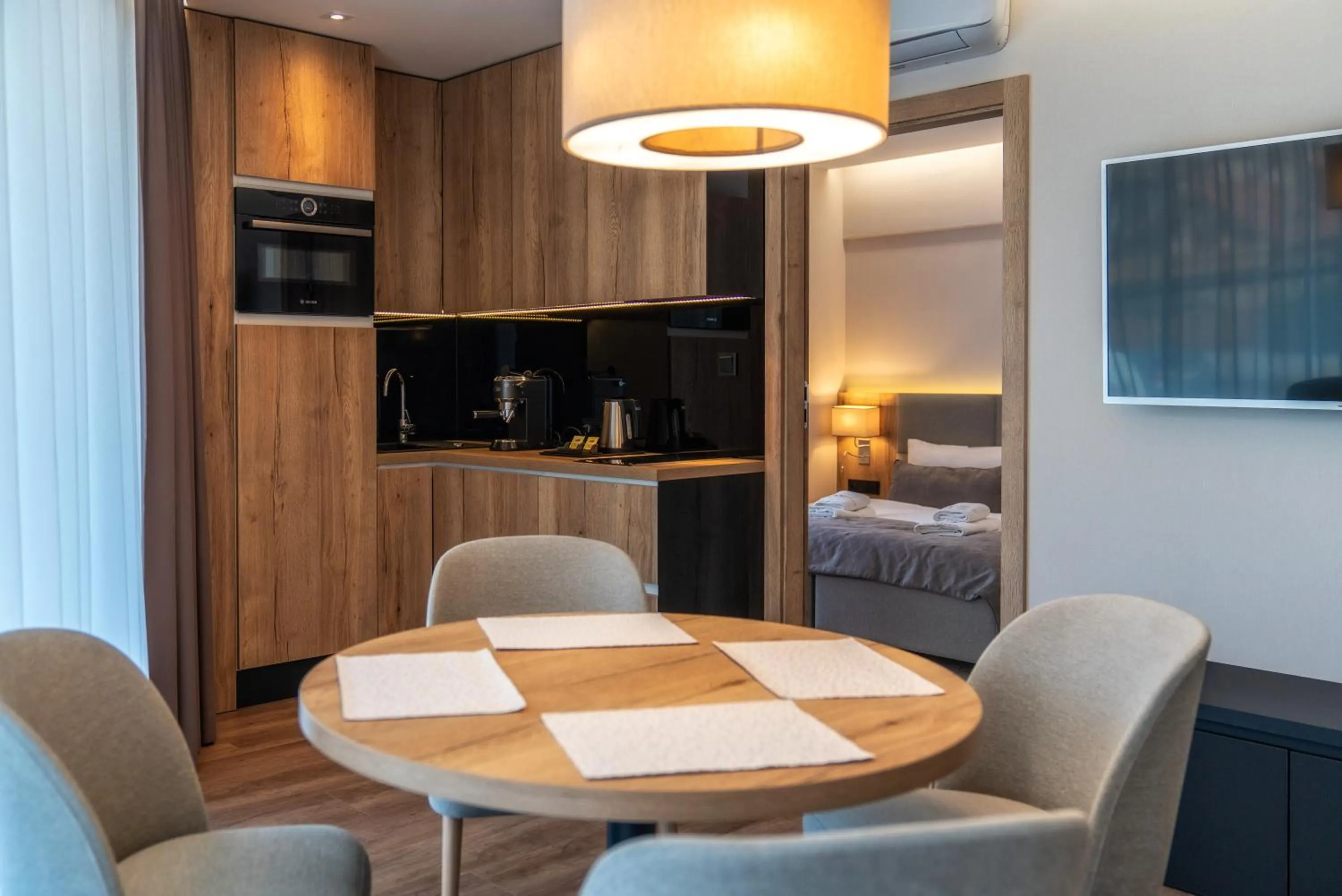 Kitchen or kitchenette, Bed in Meta Apartments