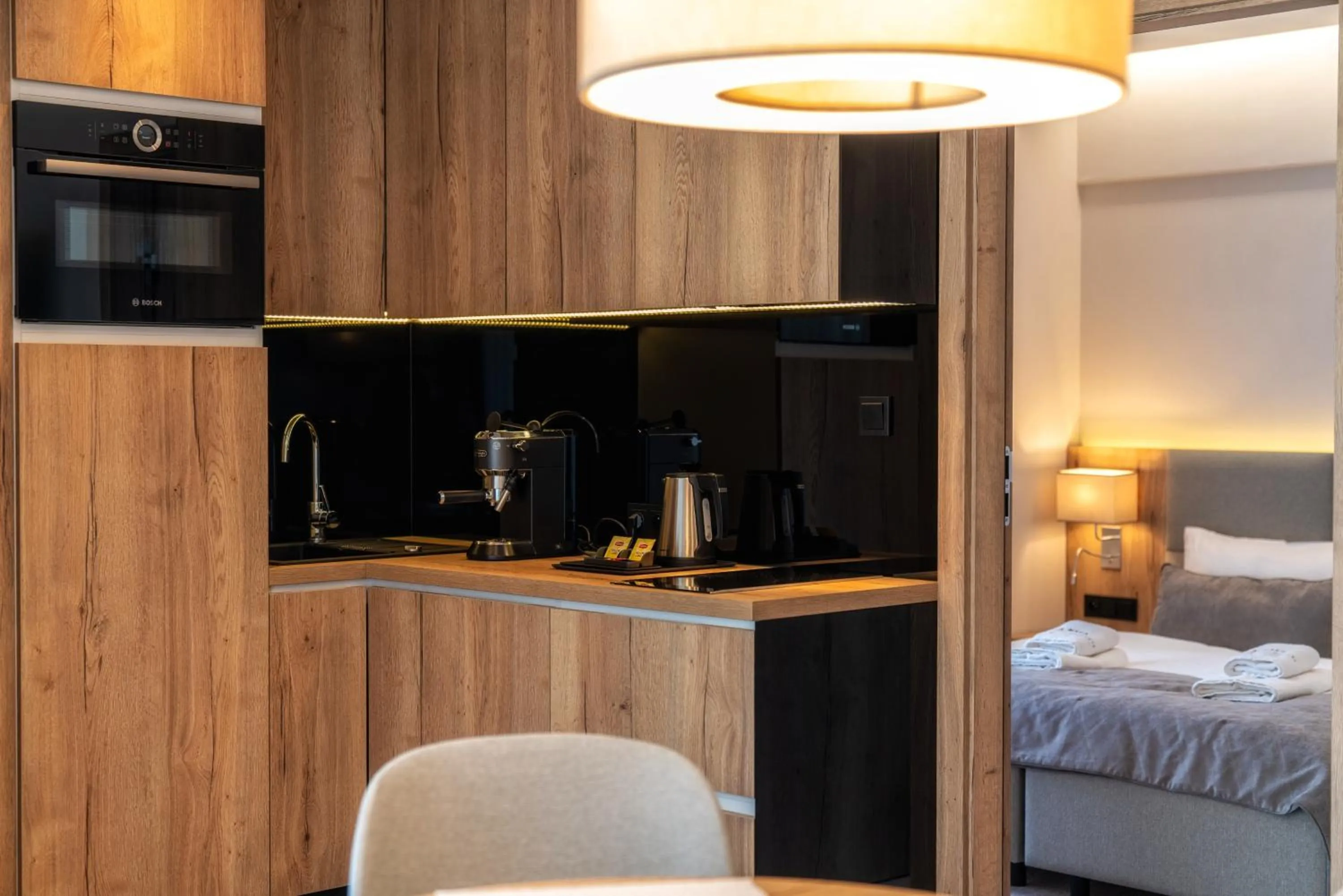 Kitchen or kitchenette, Bed in Meta Apartments