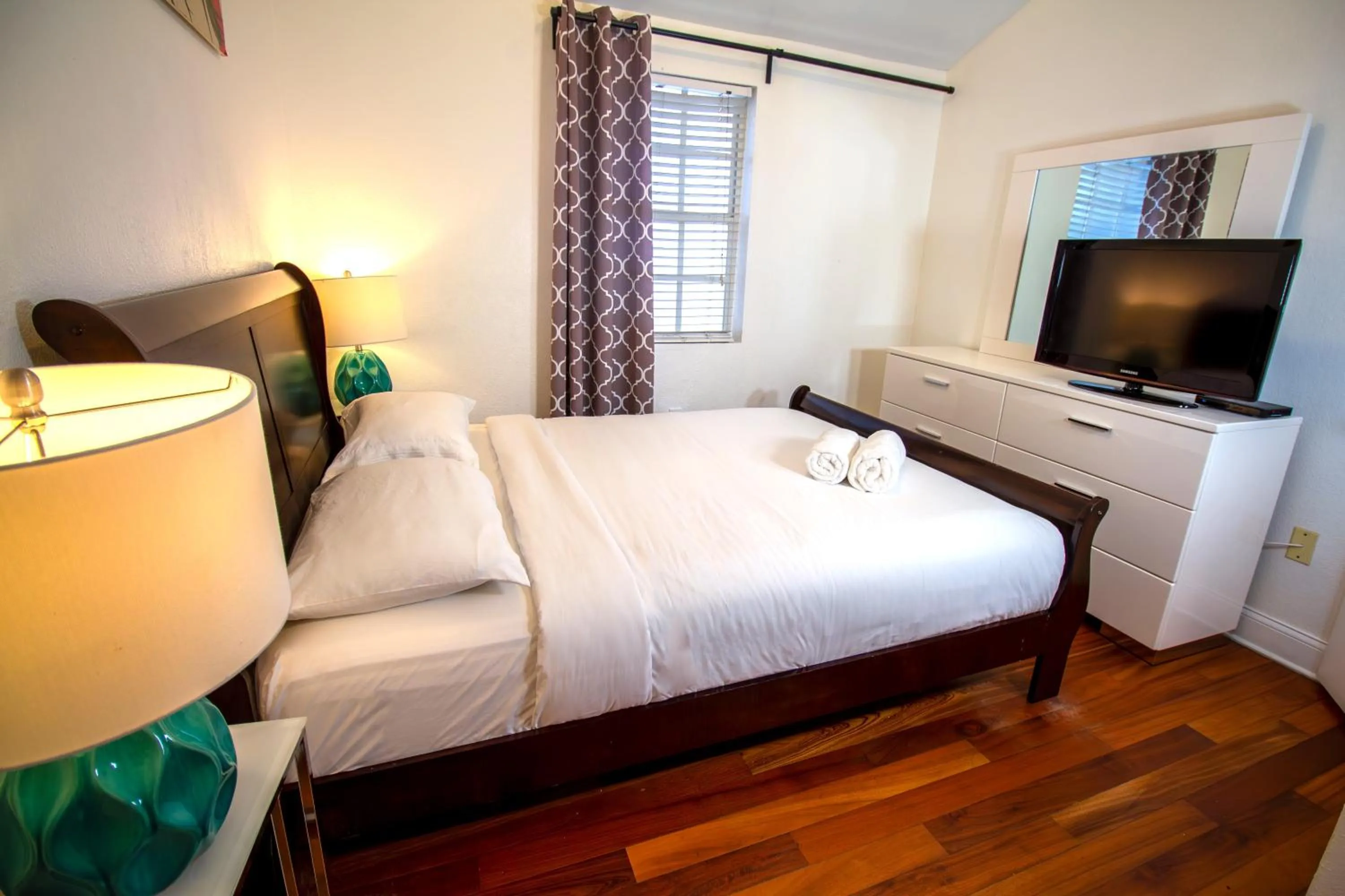 Bed in Hispaniola Apartments Part of the Oasis Casita Collection