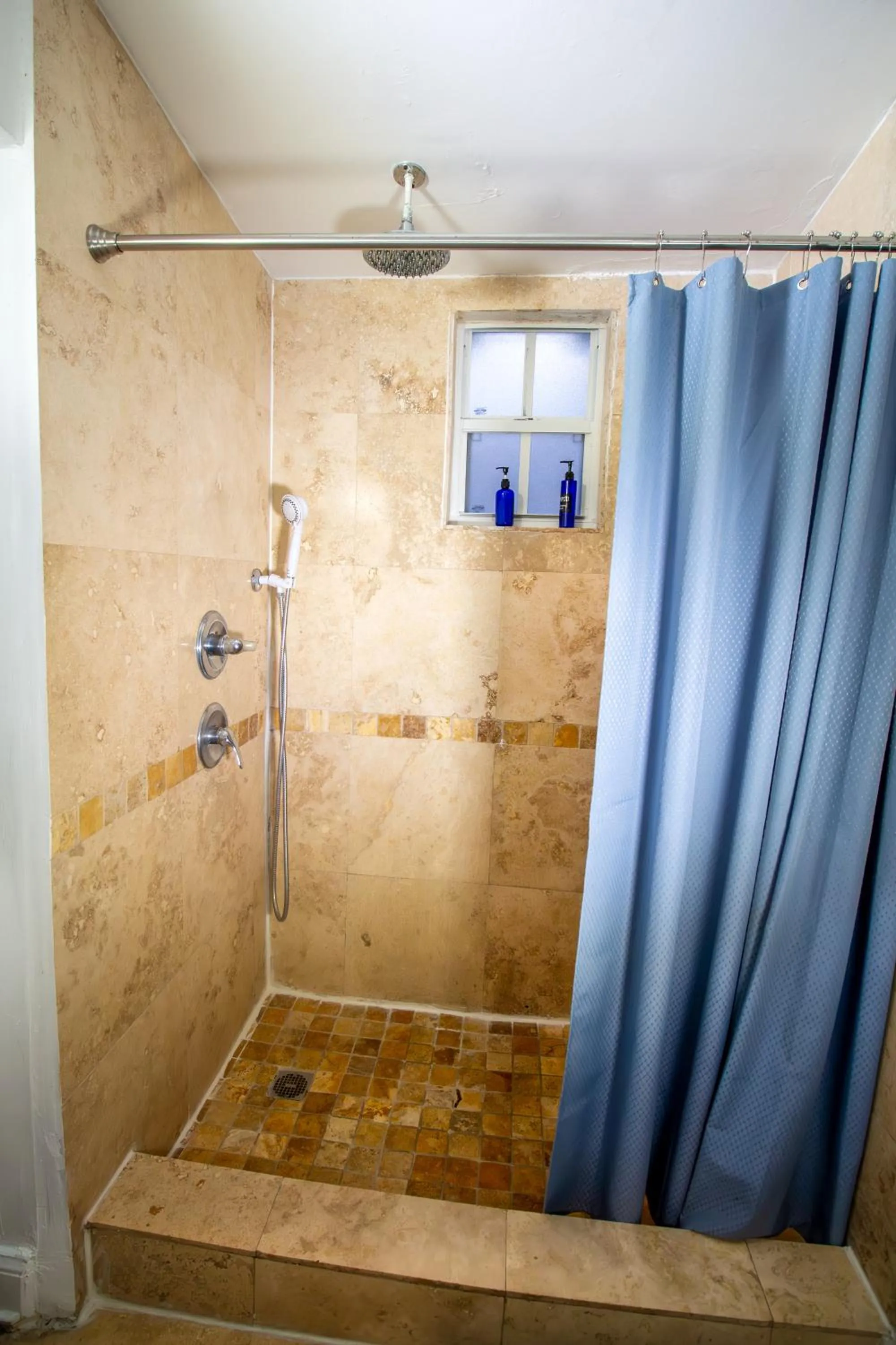 Shower in Hispaniola Apartments Part of the Oasis Casita Collection