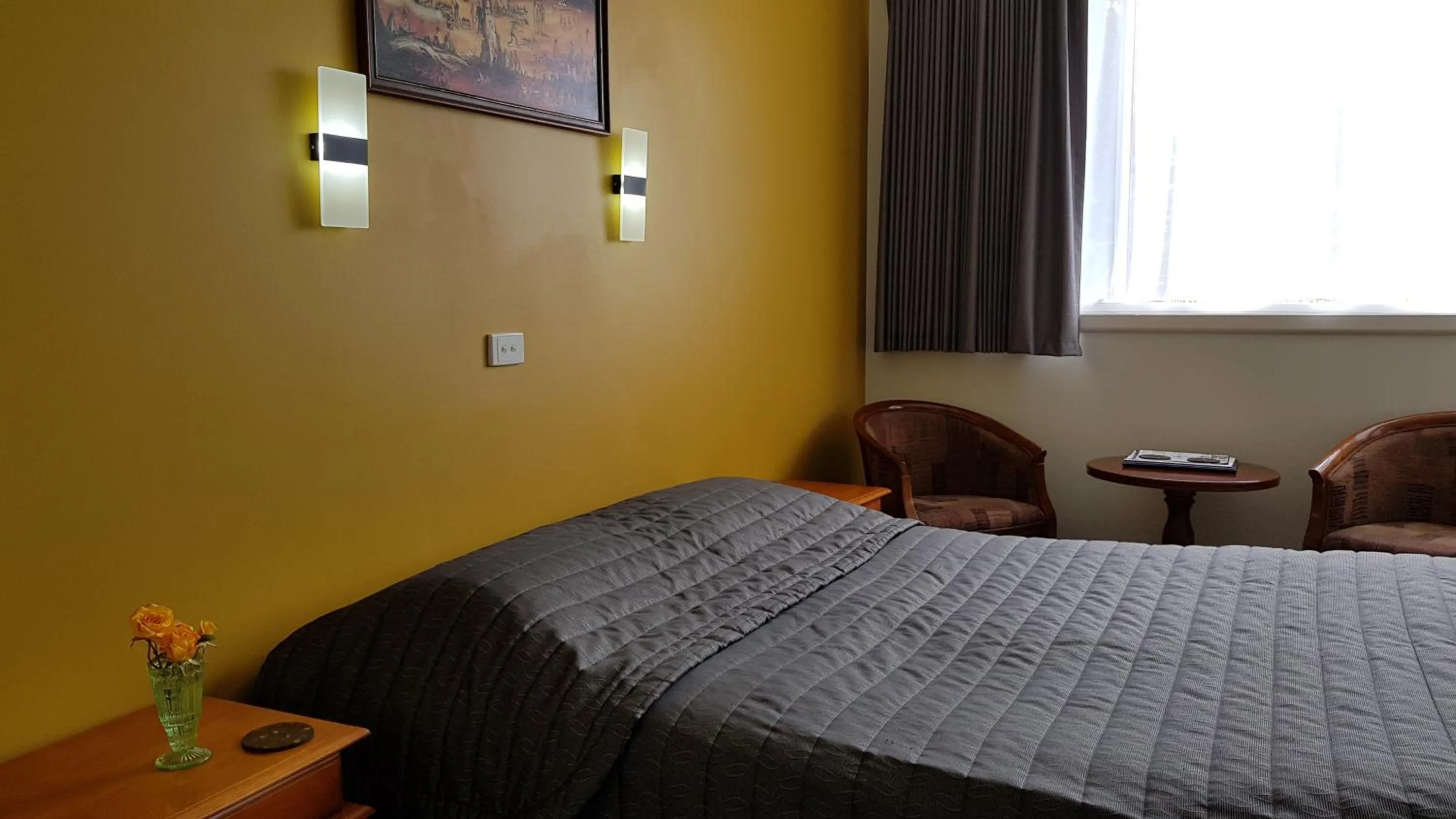 Photo of the whole room, Bed in Daylesford Motor Inn Vic Pty Ltd