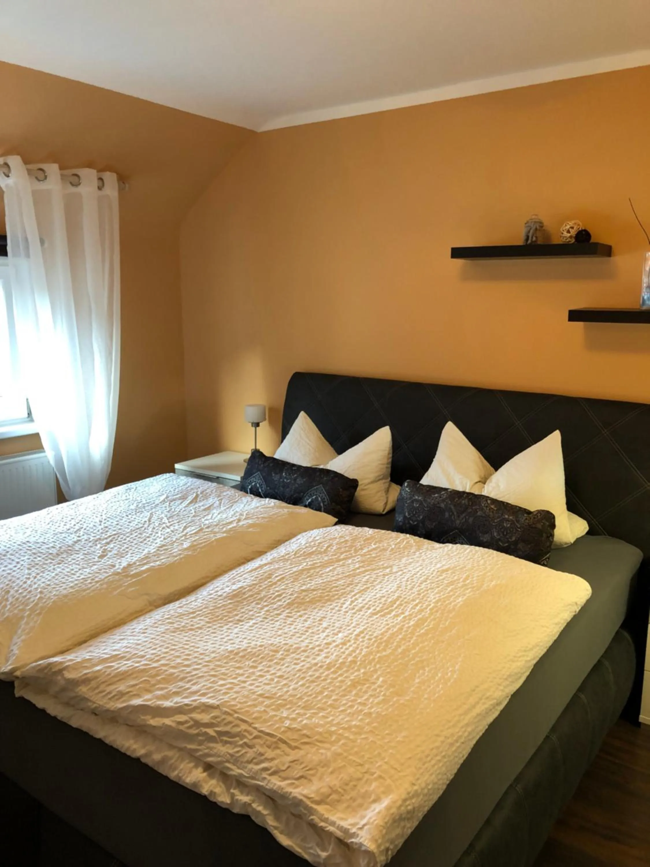 Bed in Hotel-Restaurant Gasthof zum Schützen