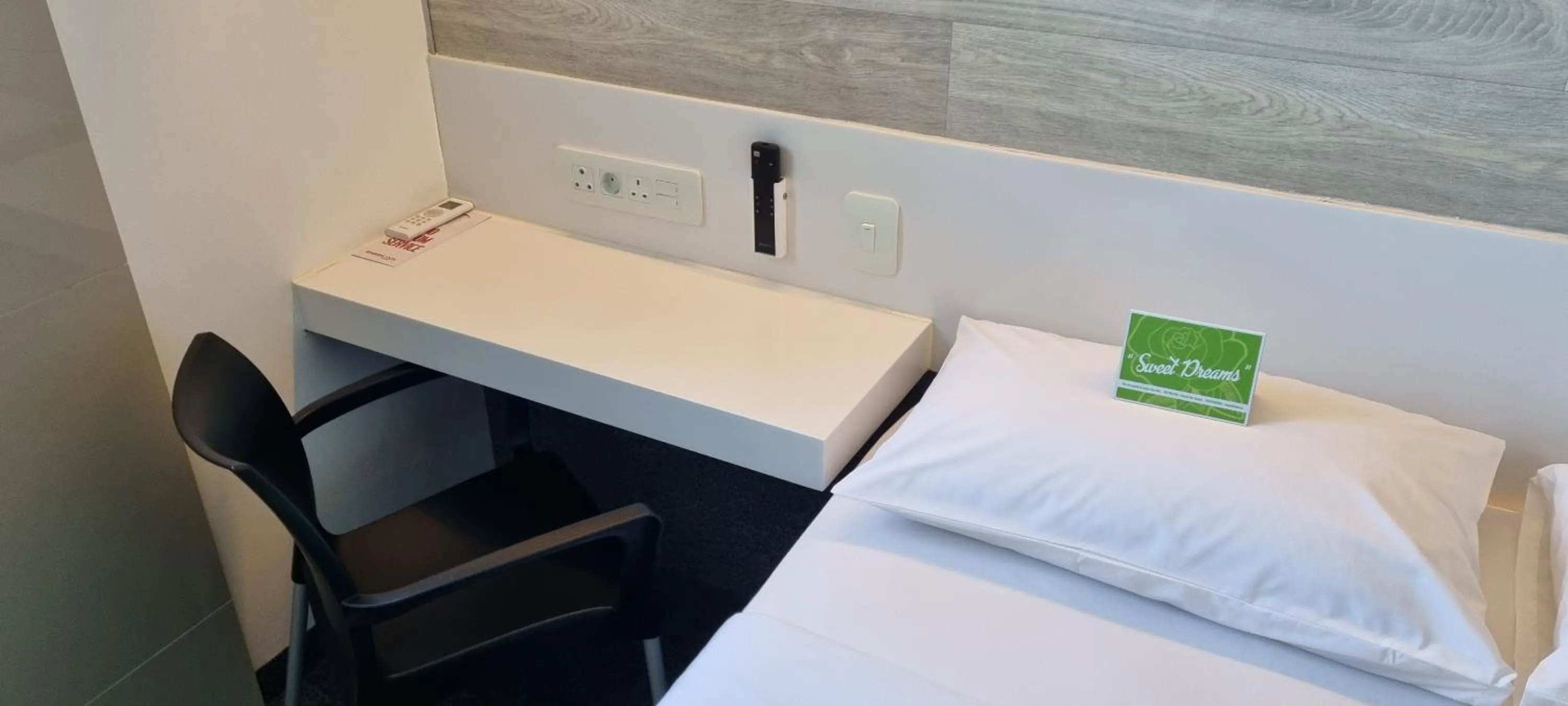 Bed in Check Inn Hotel