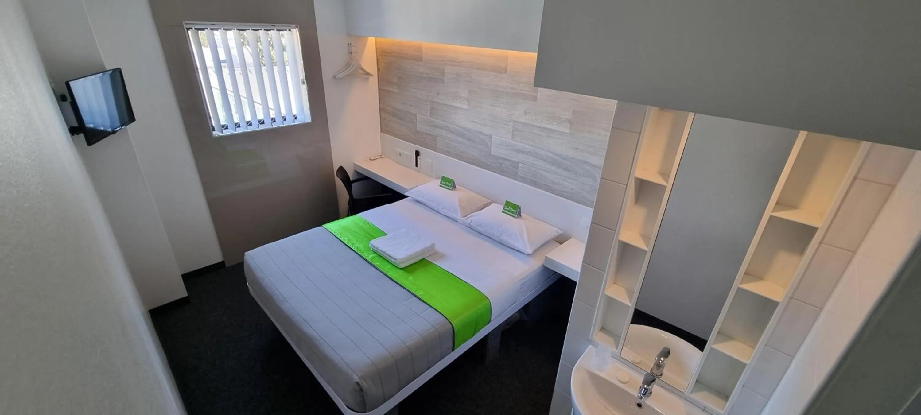 Bed in Check Inn Hotel