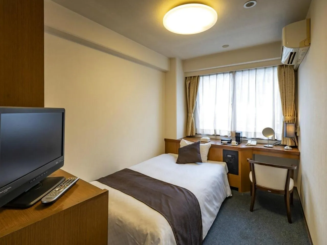 Bed in Hotel Fukiageso