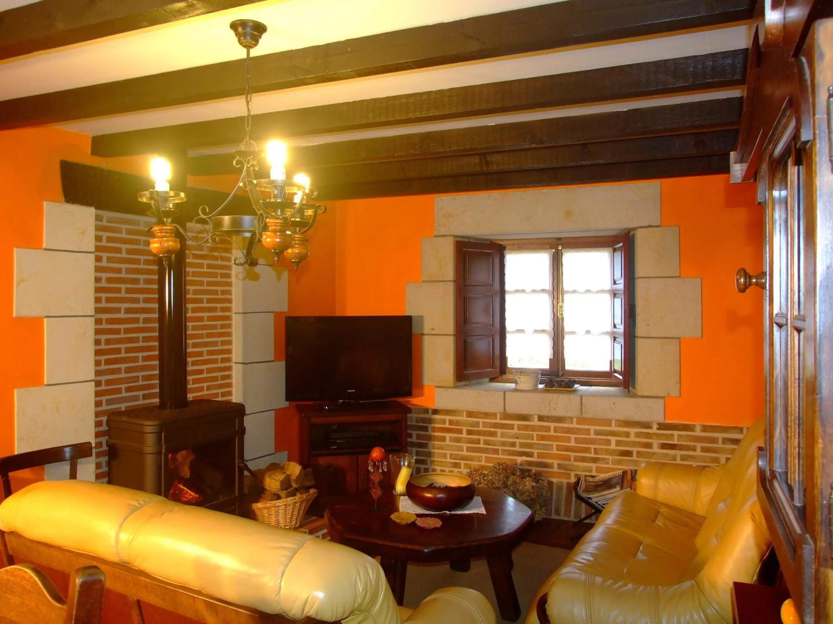 Communal lounge/ TV room in Posada Gema