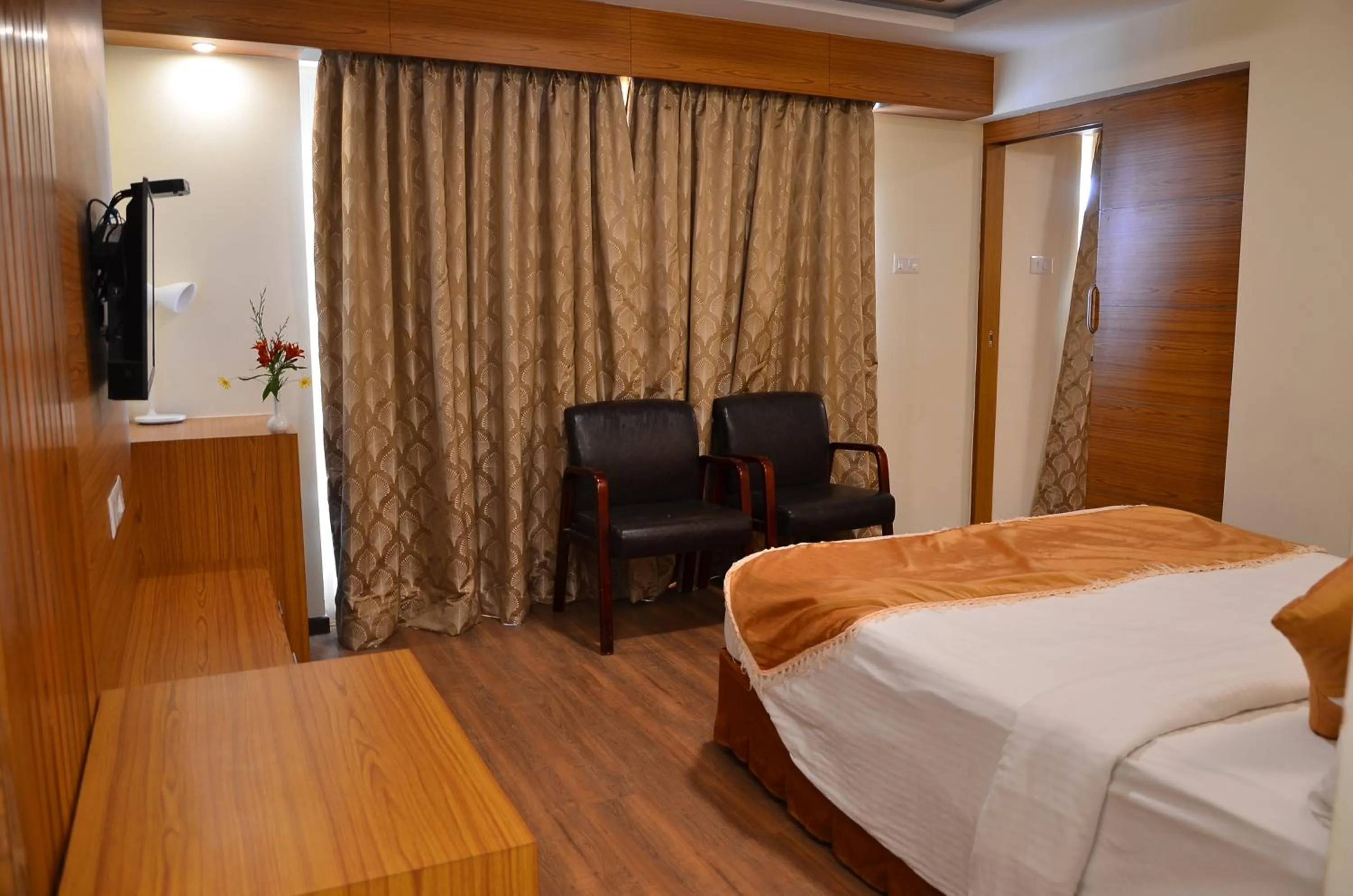 Bed in Benzz Park Family Resort Kodaikanal