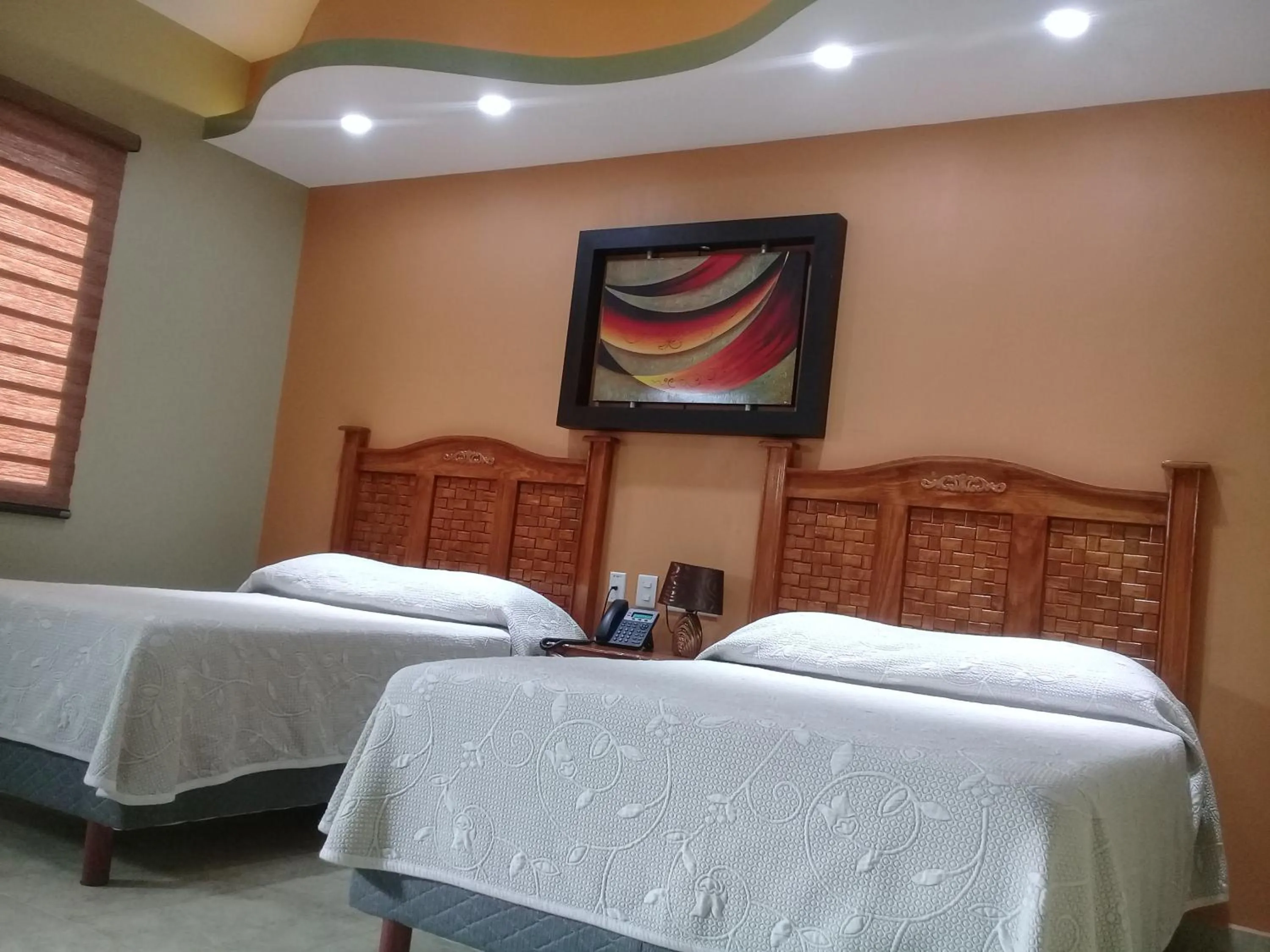 Bed in HOTEL RESTAURANTE TEQUILA