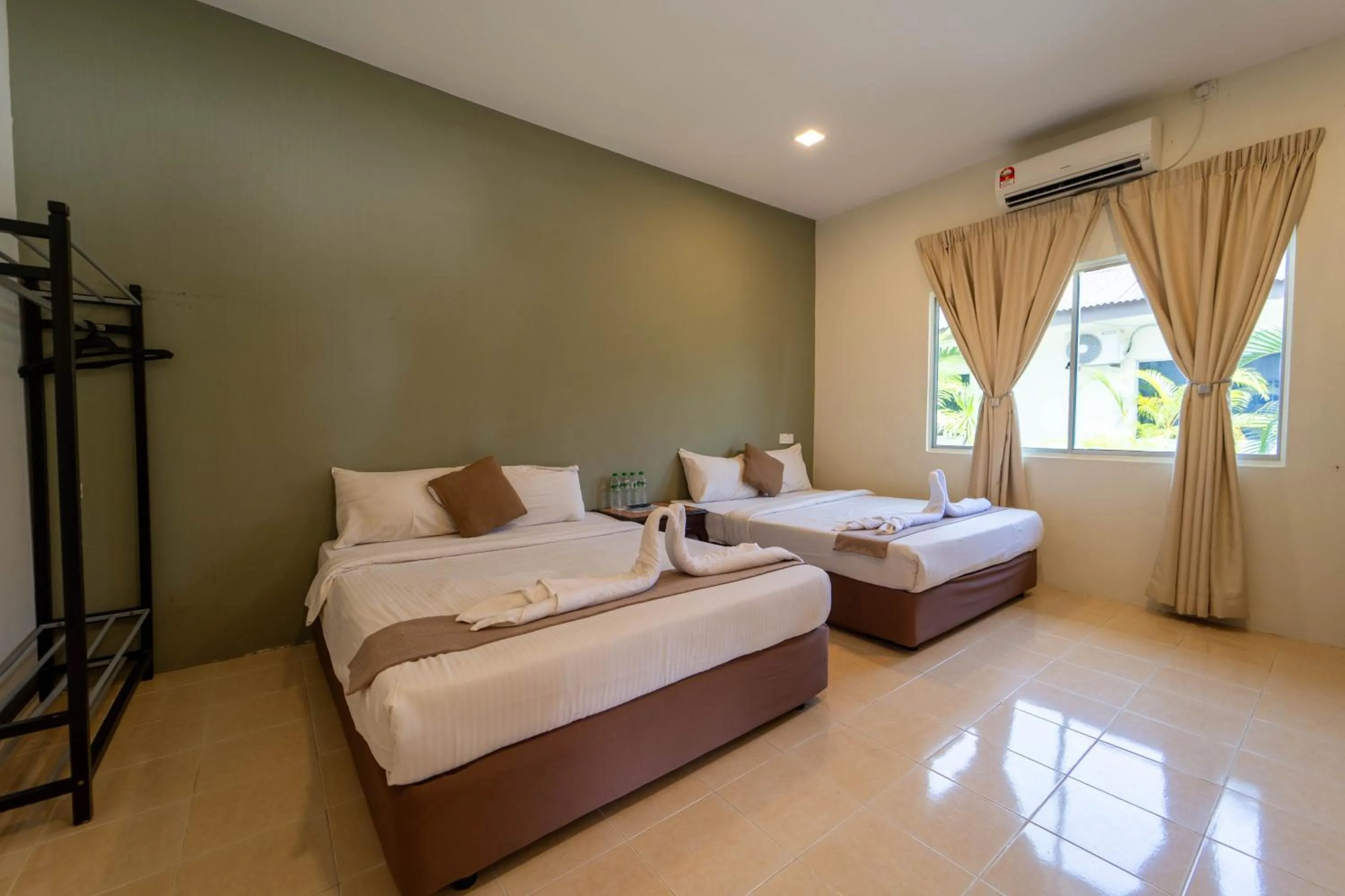 Bed in SANDY GARDEN RESORT LANGKAWI