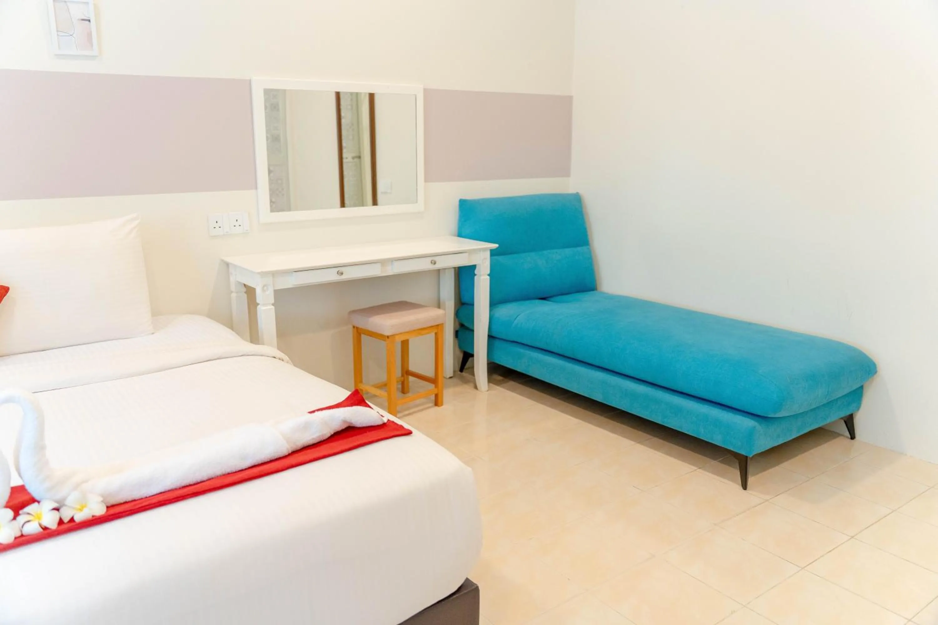 Bed in SANDY GARDEN RESORT LANGKAWI